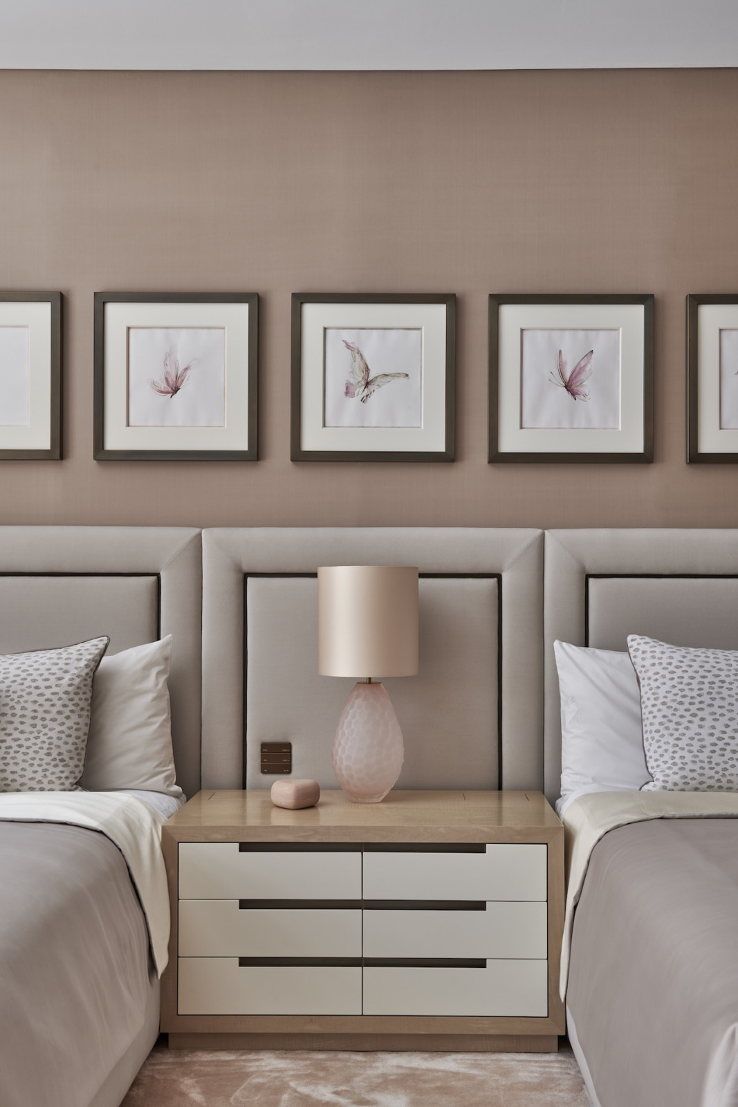 A bedroom in a penthouse apartment on Palm Jumeirah Island, Dubai designed by Lumi Interiors