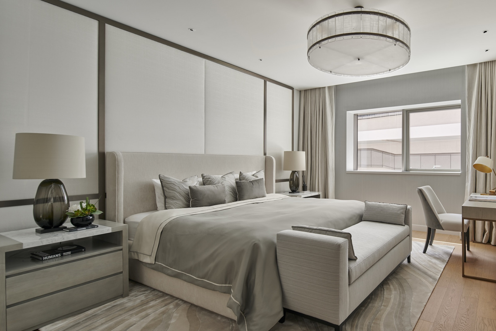 A bedroom in a penthouse apartment on Palm Jumeirah Island, Dubai designed by Lumi Interiors