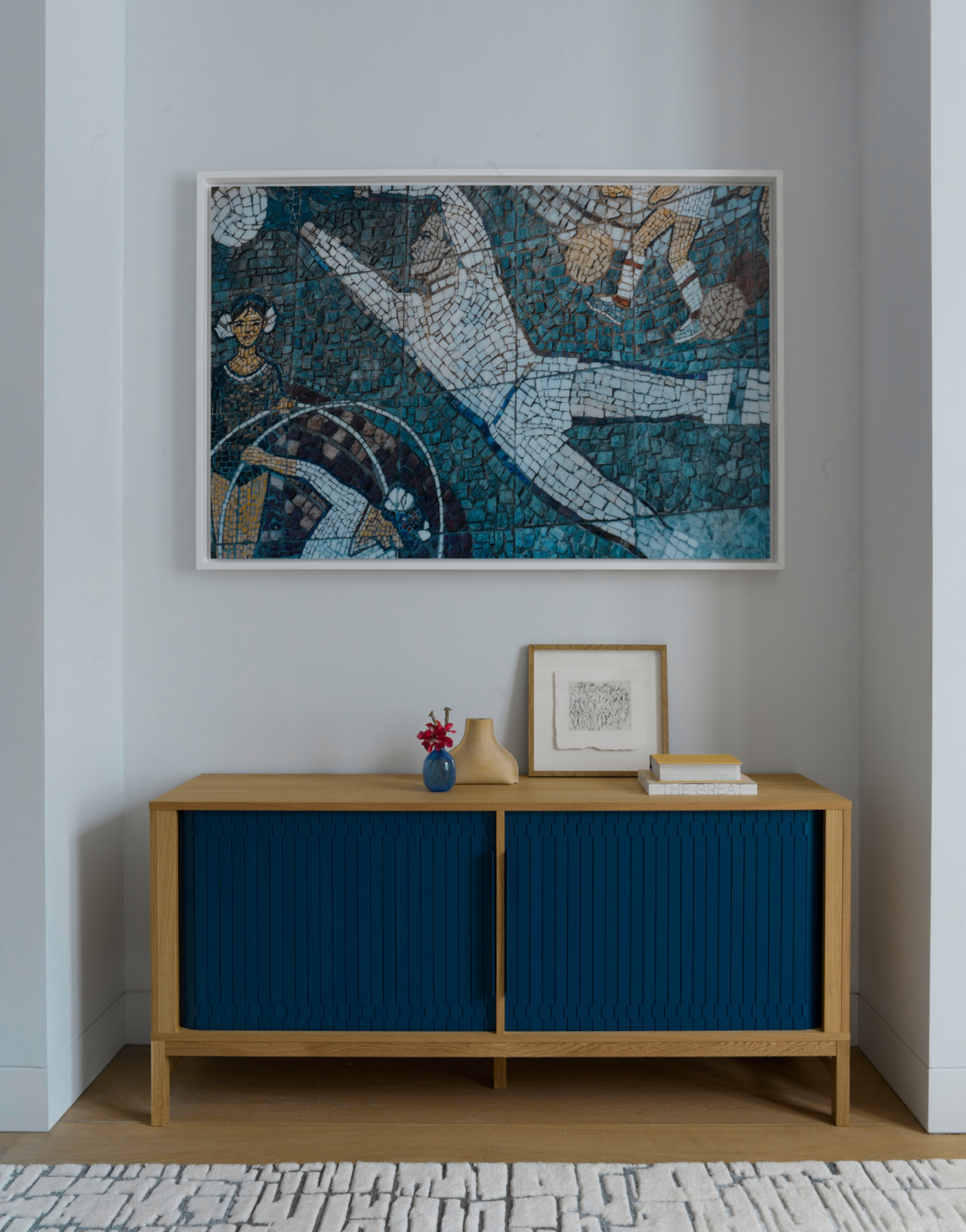 An artwork from James Hill’s ’Monumental mosaic of Moscow’ art series hangs above a Norman Copenhagen sideboard