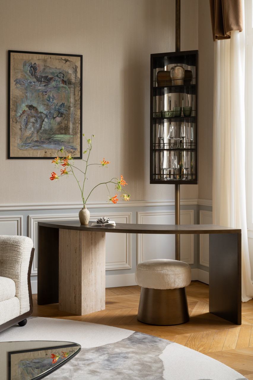 A corner of the living room is enhanced with custom pieces bathed in natural light