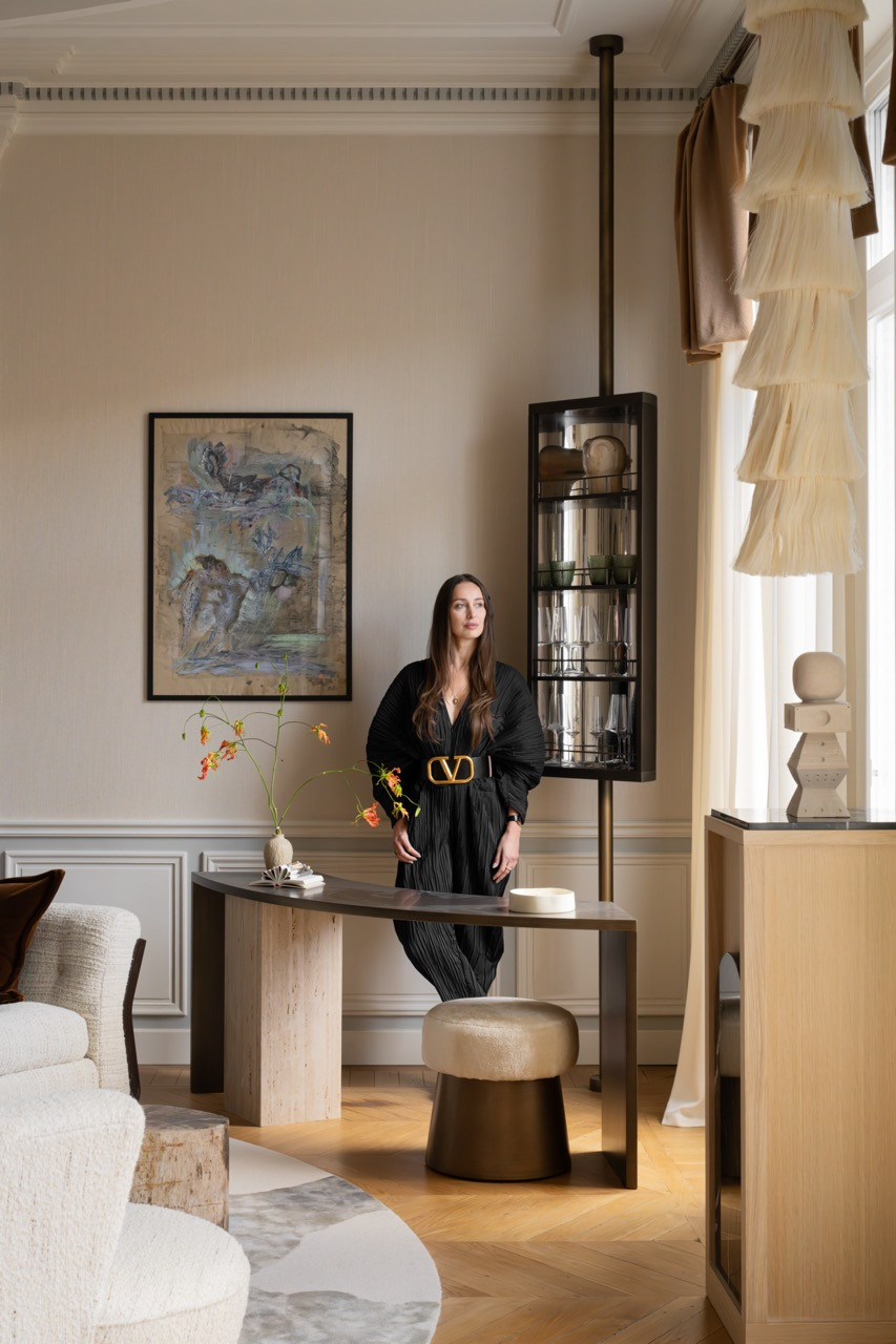 Designer Olga Ashby in the living area, which she designed to provide “a purely hedonistic experience, where hosting friends at home is more appealing than going out”