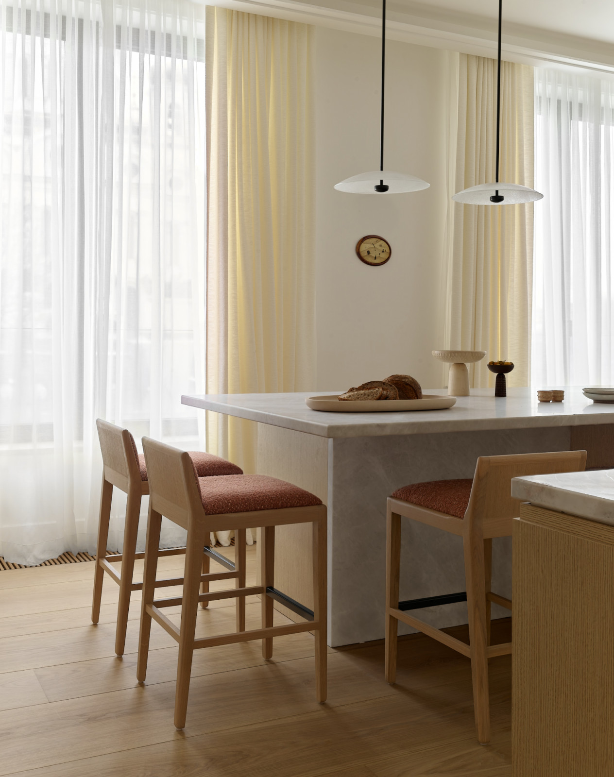 A delicate play of textures, artisanal finishes, and gentle light