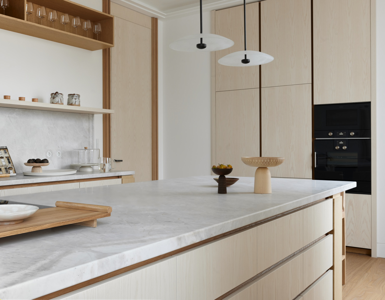 The kitchen with foundations of creamy vanilla and honey-toned wood