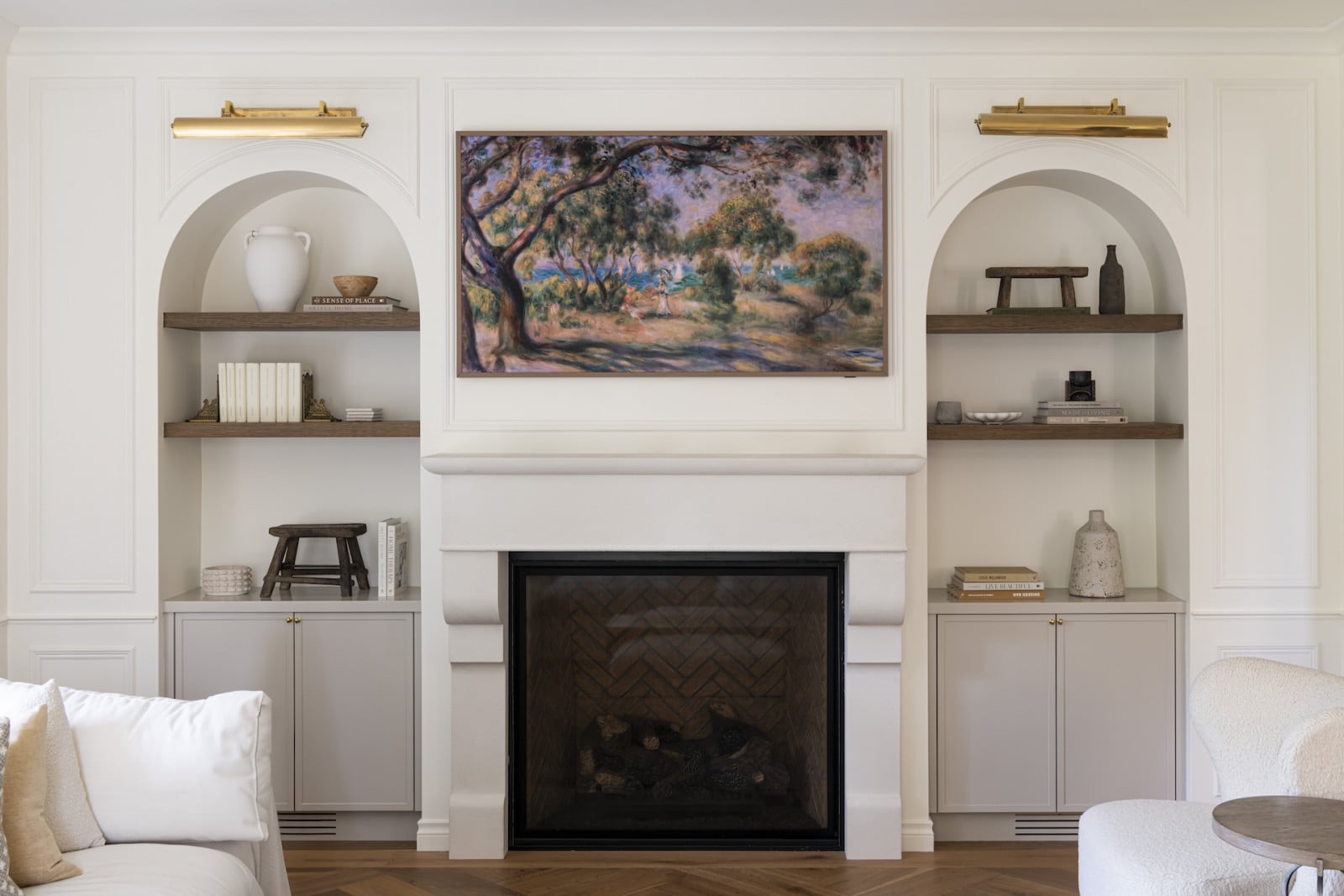 The living room in a restored Victoria, British Columbia home, designed by Lauren Kyle McDavid for NHL player Tyson Barrie