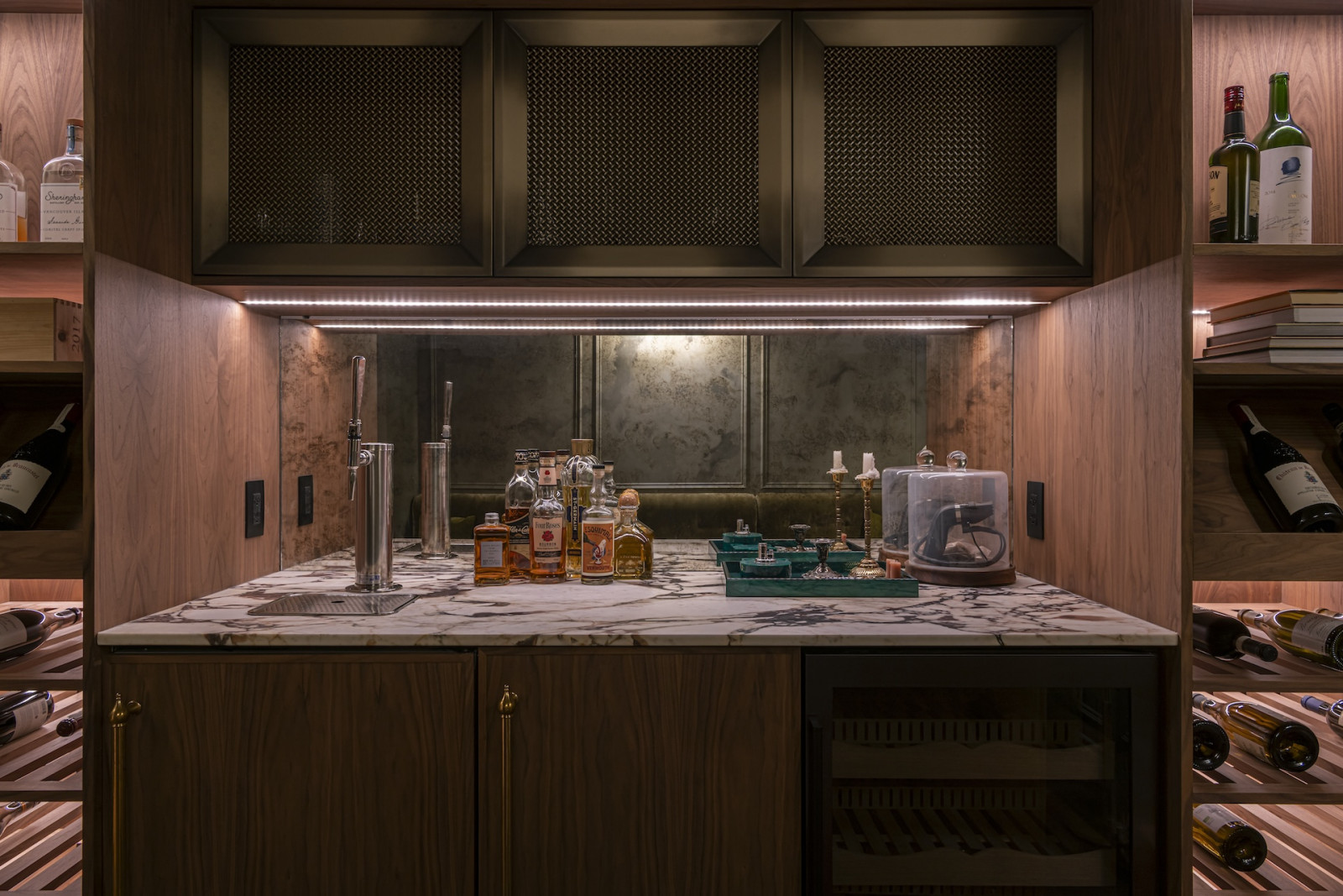 The basement's speakeasy cigar lounge in a restored Victoria, British Columbia home, designed by Lauren Kyle McDavid for NHL player Tyson Barrie