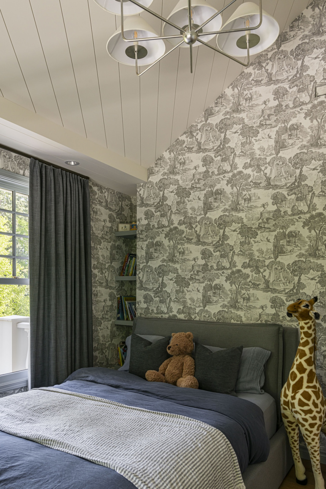 A bedroom in a restored Victoria, British Columbia home, designed by Lauren Kyle McDavid for NHL player Tyson Barrie