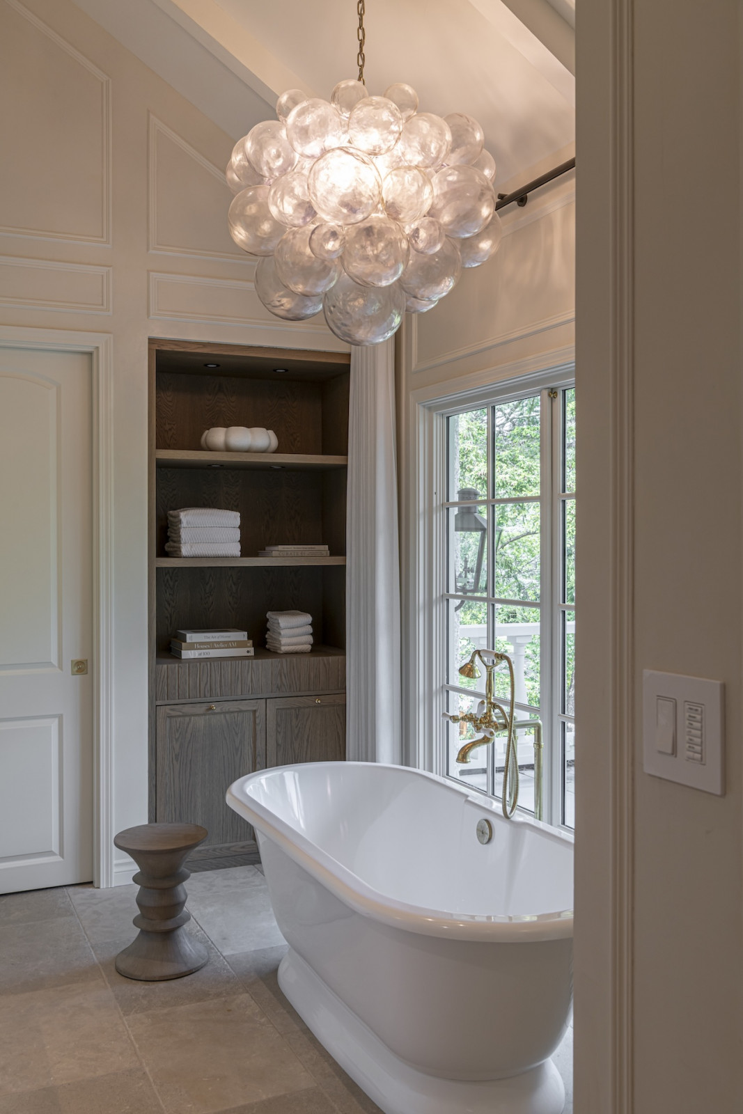 The primary suite bathroom in a restored Victoria, British Columbia home, designed by Lauren Kyle McDavid for NHL player Tyson Barrie
