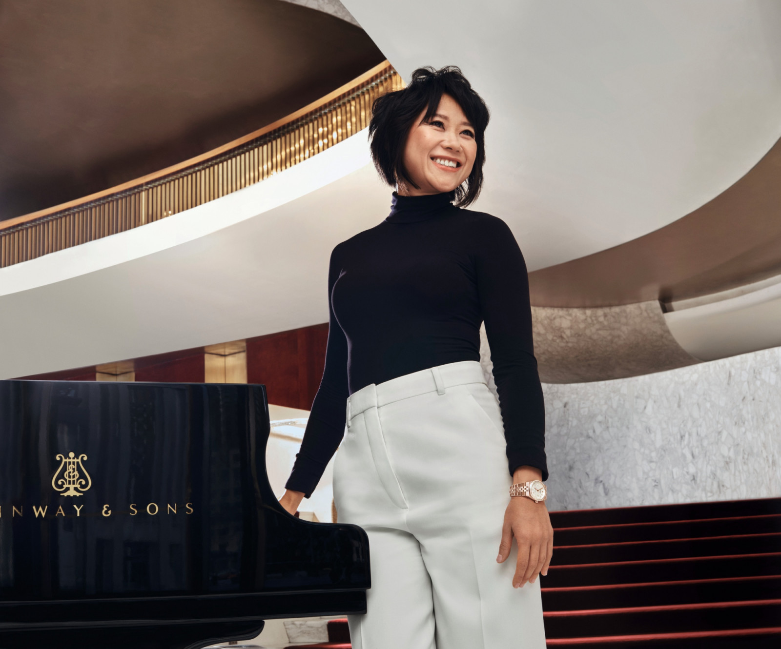 Yuja Wang wears a Land-Dweller 36 in 18 ct
Everose gold with a diamond-set bezel