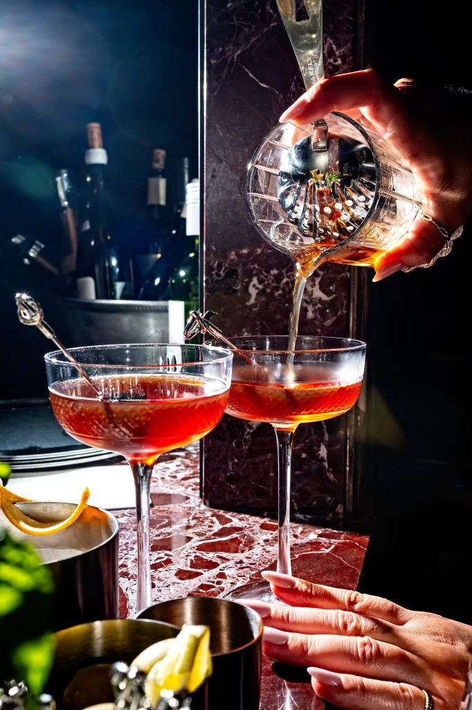 WASHINGTON, DC- MARCH 14: Manhattan Cocktails being poured at the upstairs bar at Occidental Restaurant photographed March 14, 2025 in Washington, DC. (Photo by Scott Suchman for The Washington Post via Getty Images)
