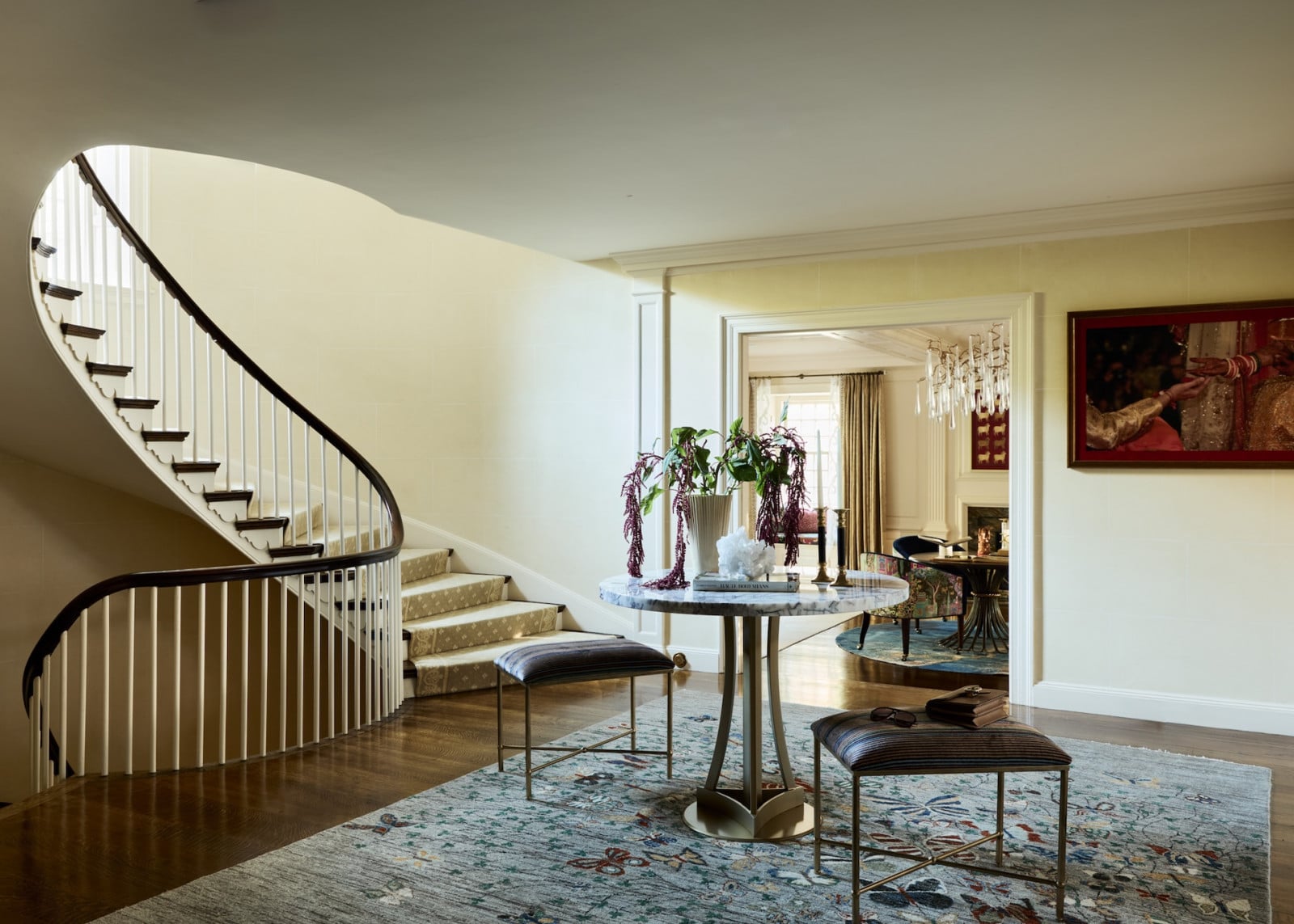 The foyer of a dining room in a maximalist 1920s Georgian home in Boston that blends Mexican and Indian influences, designed by Vani Sayeed Studio