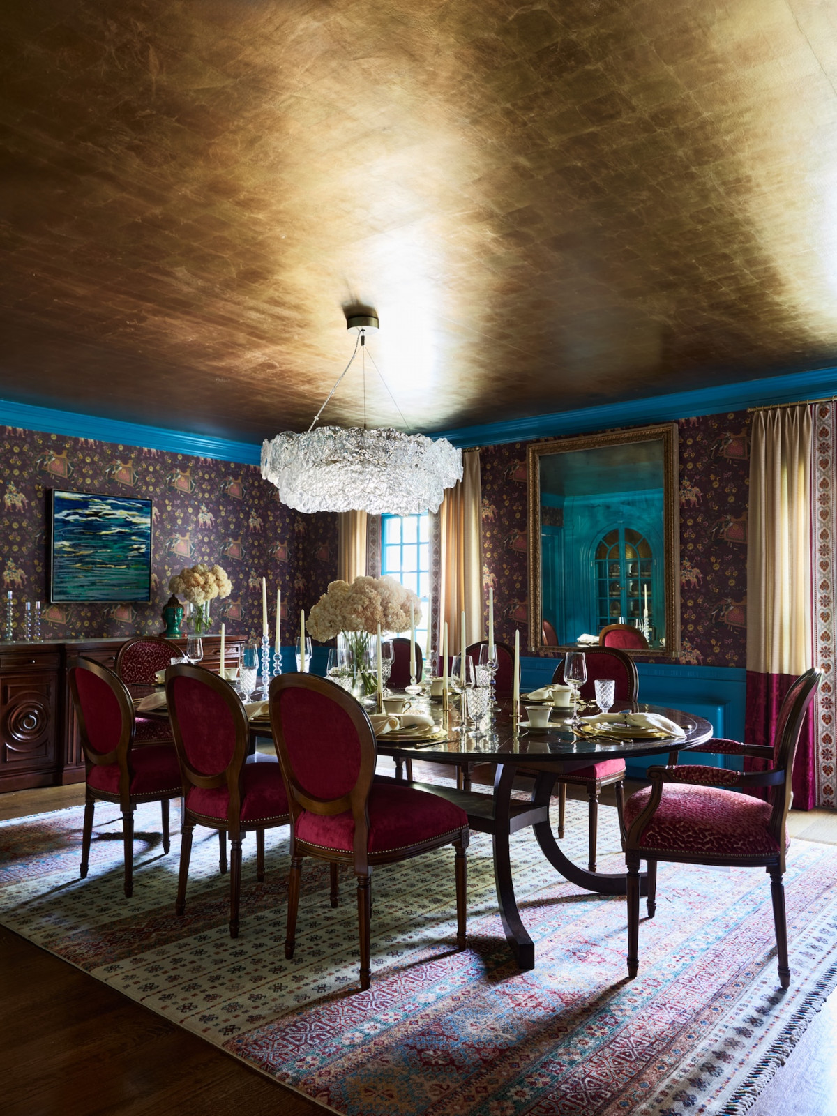 The dining room in a maximalist 1920s Georgian home in Boston that blends Mexican and Indian influences, designed by Vani Sayeed Studio