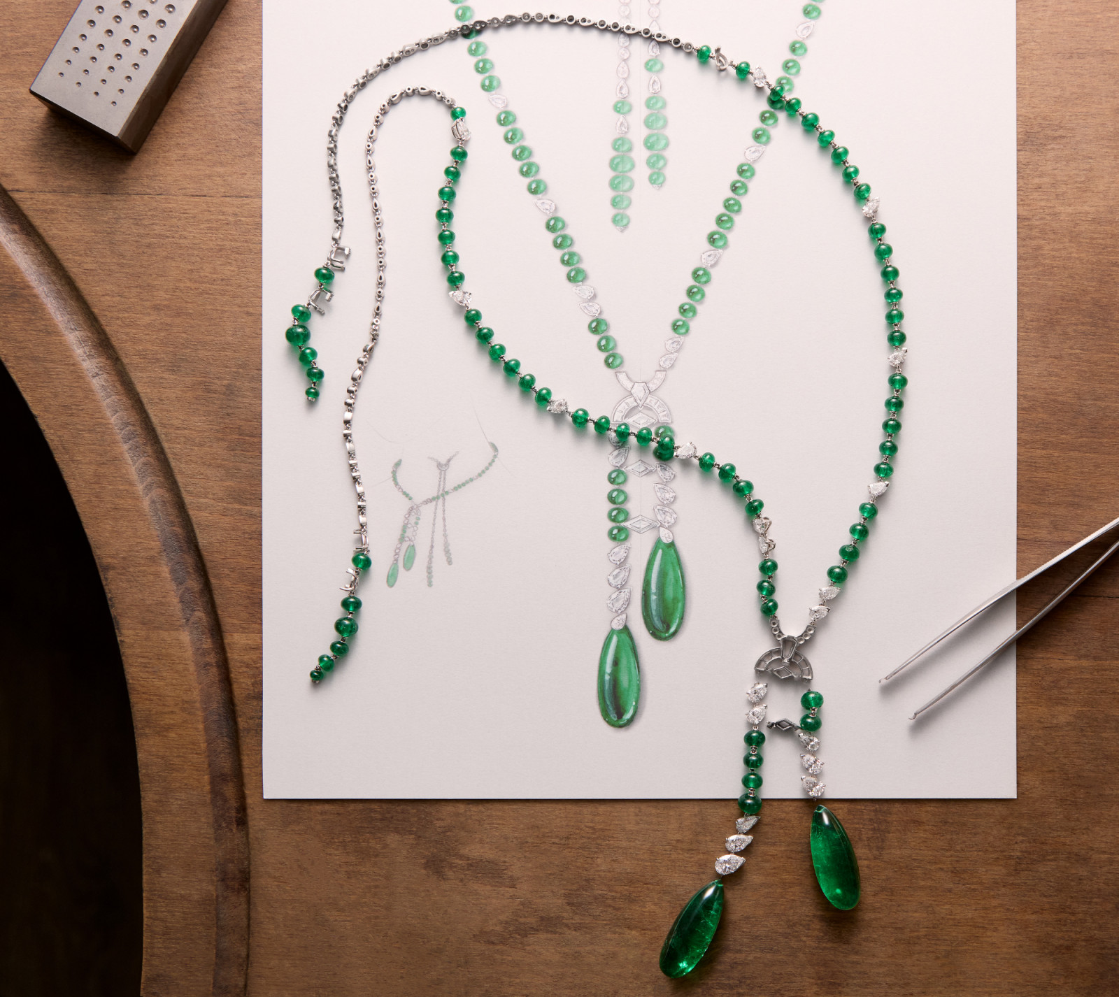 En Équilibre Shito Earrings, platinum, emeralds, emerald beads, diamonds (Photo: courtesy of Cartier)