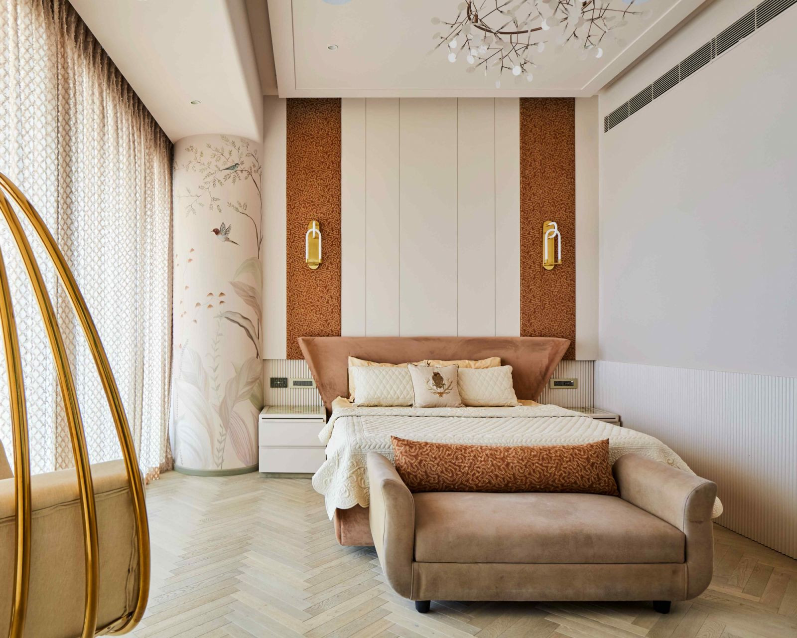 The master bedroom exudes feminine grace through a hand-painted curved column mural (Photo: Aspire Studios)