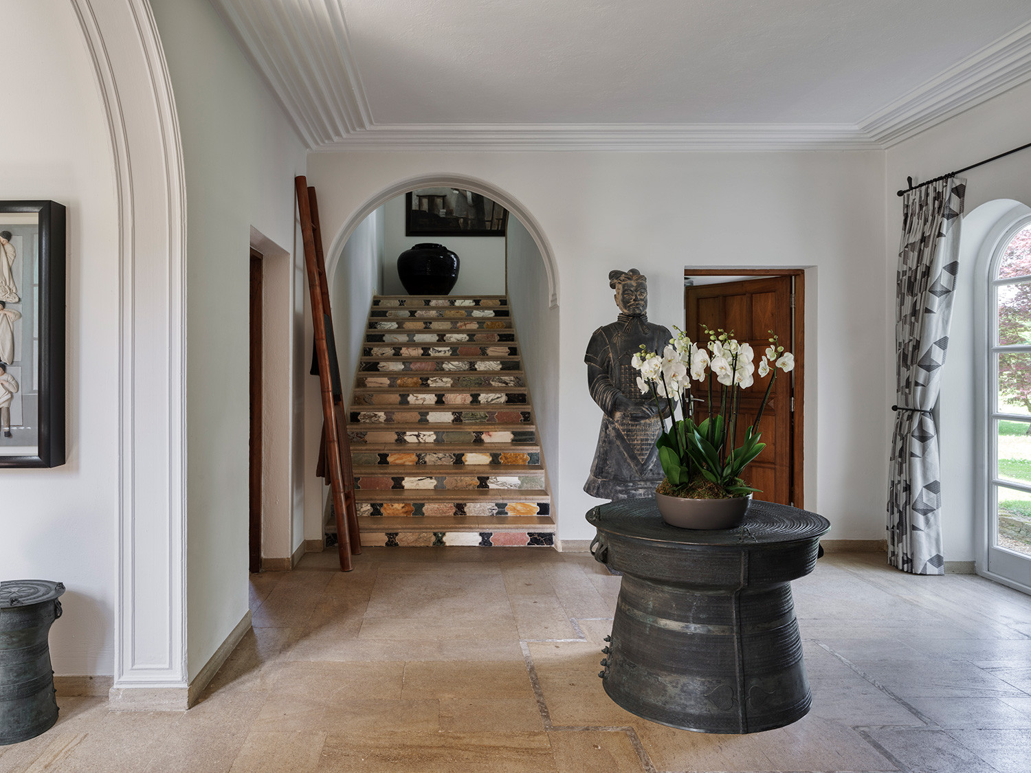 The entryway of an Arts and Crafts mansion in Buckinghamshire, England restored by the Tollgard Studio