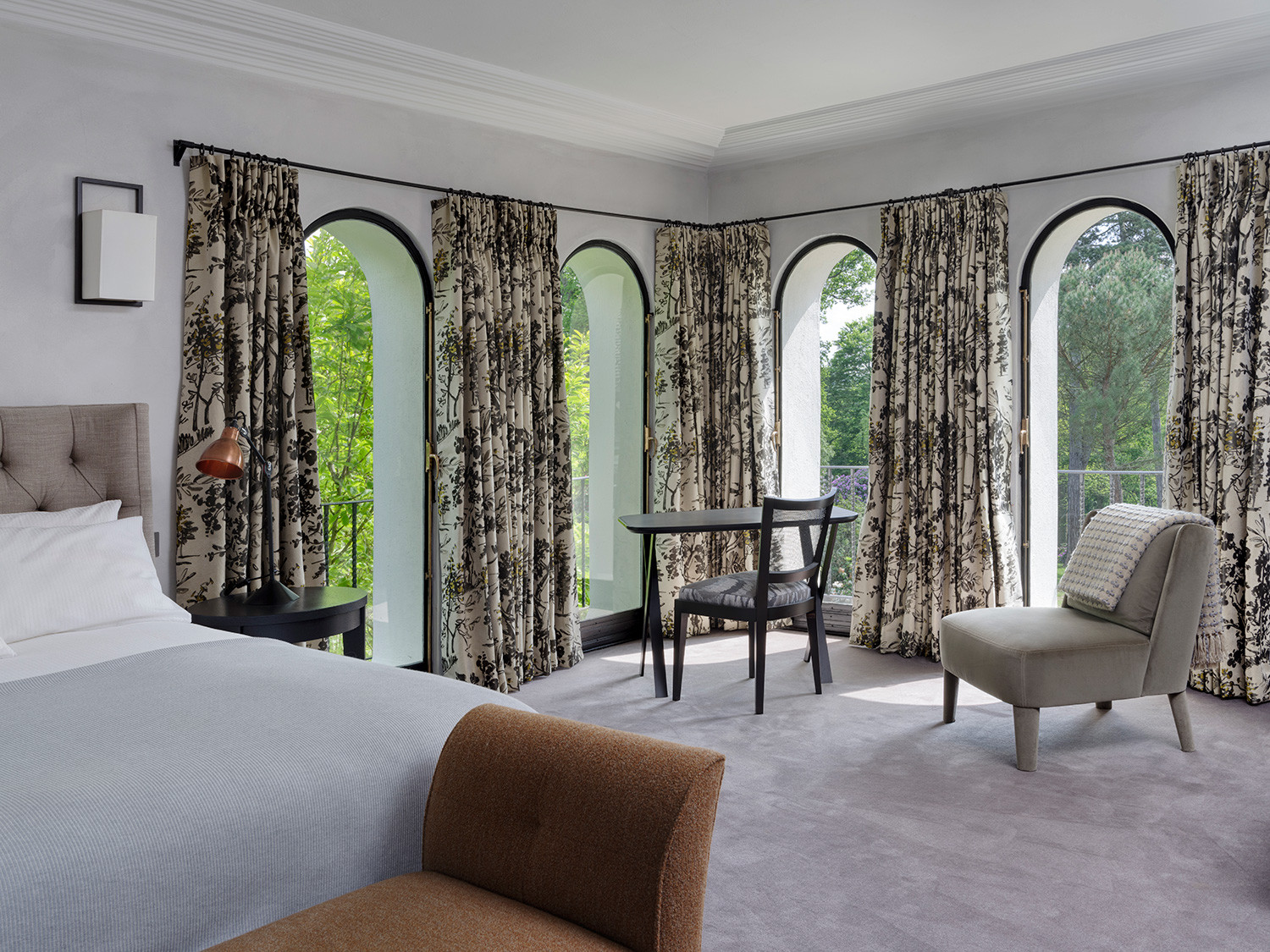 The bedroom of an Arts and Crafts mansion in Buckinghamshire, England restored by the Tollgard Studio