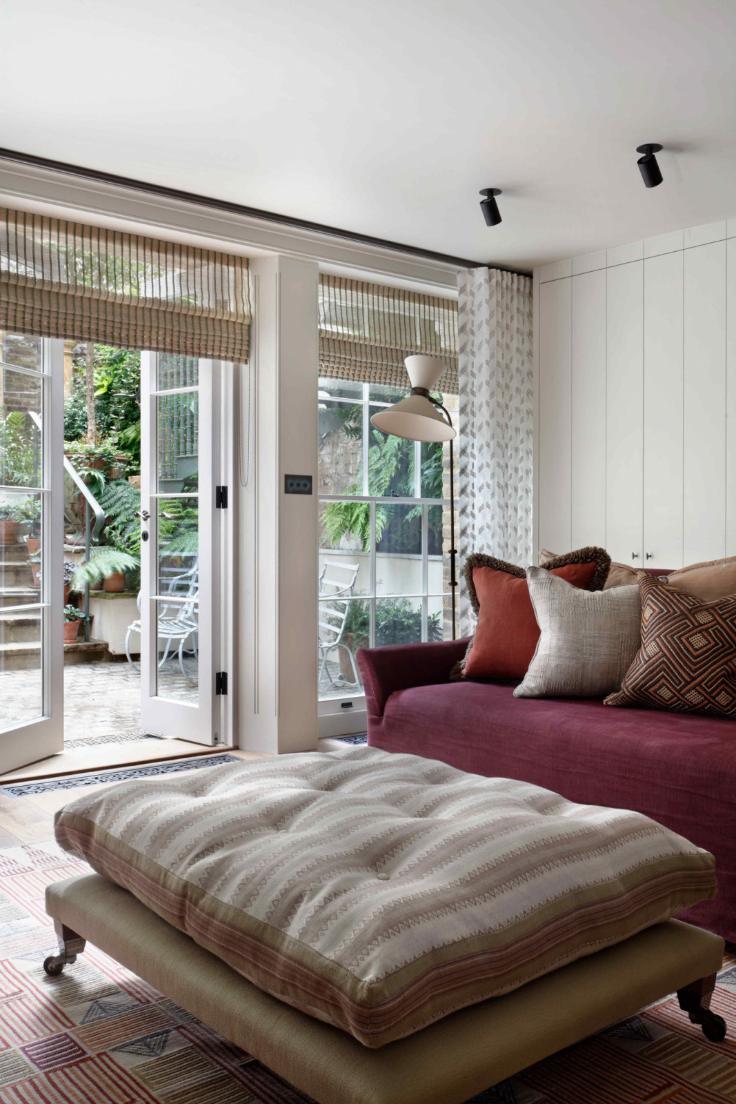 The garden room on the lower ground floor exudes a relaxed atmosphere