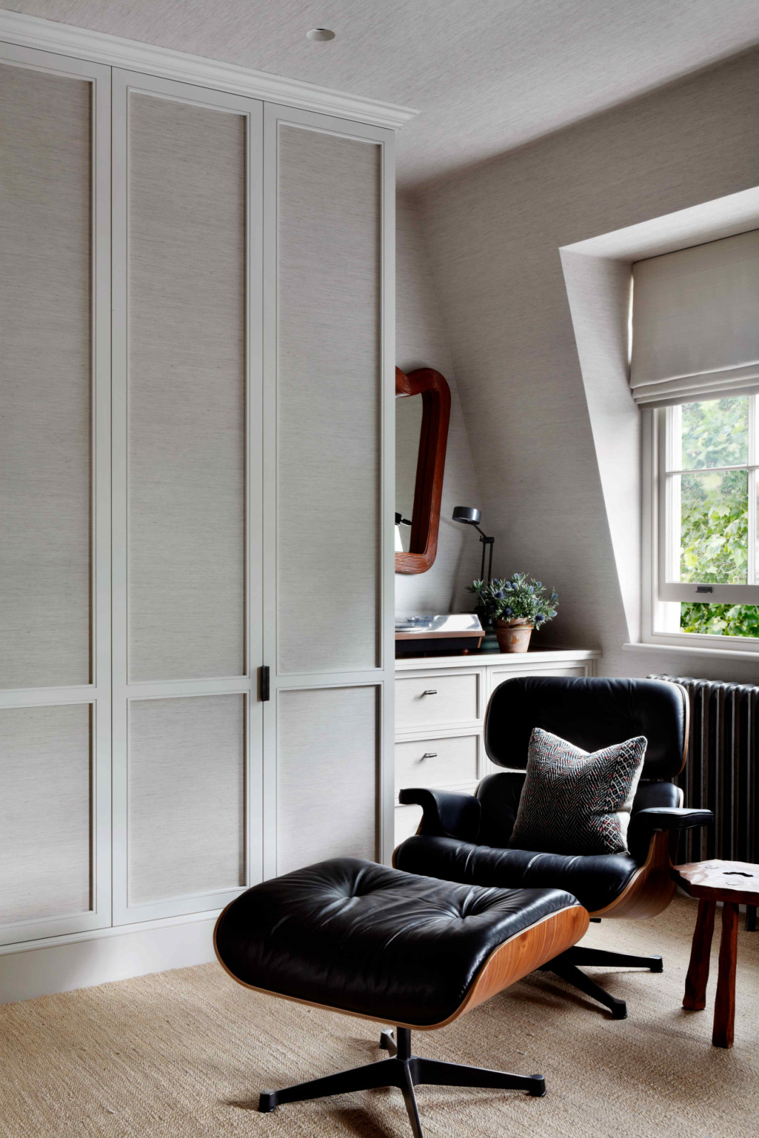 A vintage Eames lounge chair decorates the space