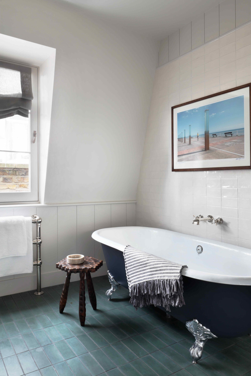 A mix of antique fittings and artwork in the son’s ensuite