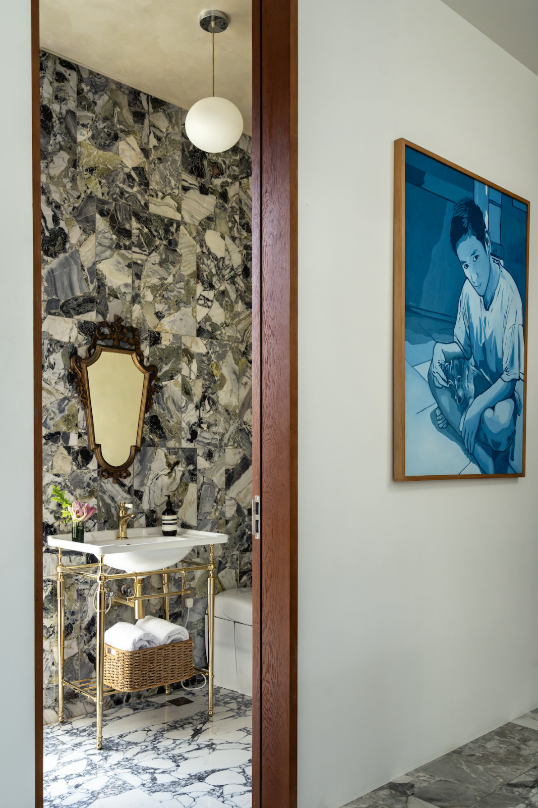 Stunning Ice Jade marble features in their powder room