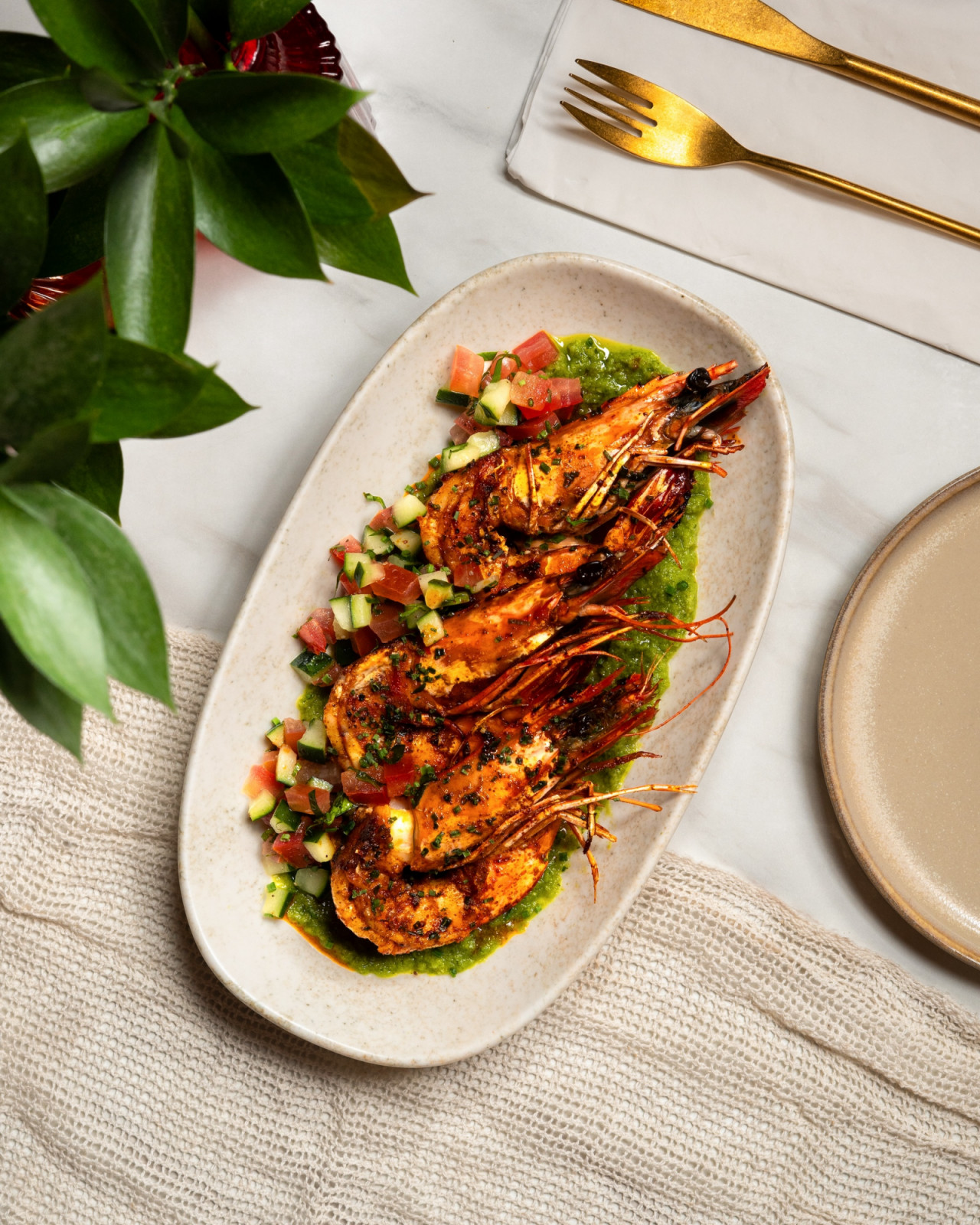 Flame-kissed prawns with a bright yet piquant green chilli Tatbila sauce (Photo: Leila) best Middle Eastern restaurants Singapore
