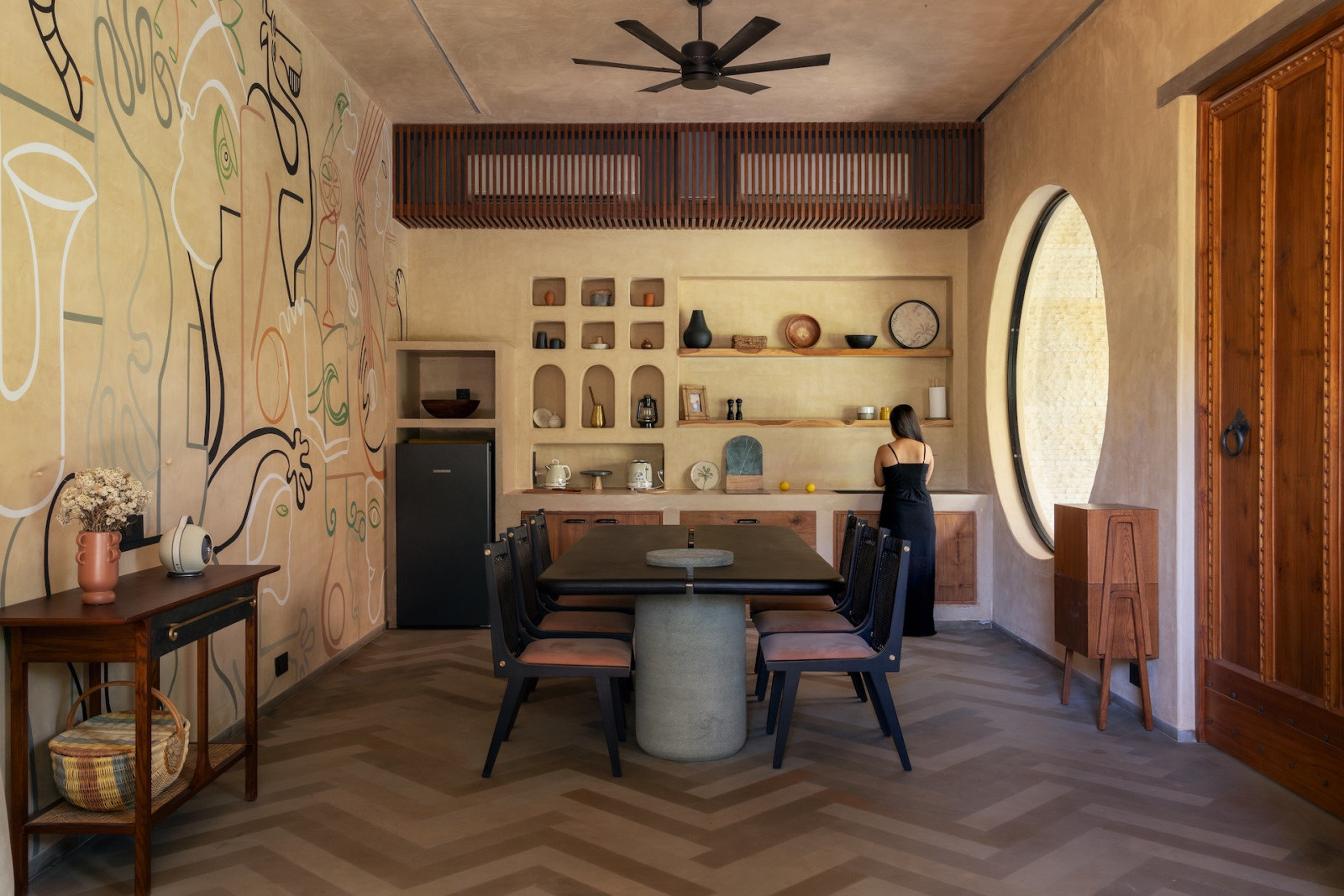 Inside the living room, dining room and kitchen of a home in Gwalior, India brought to life by Studio Dashline