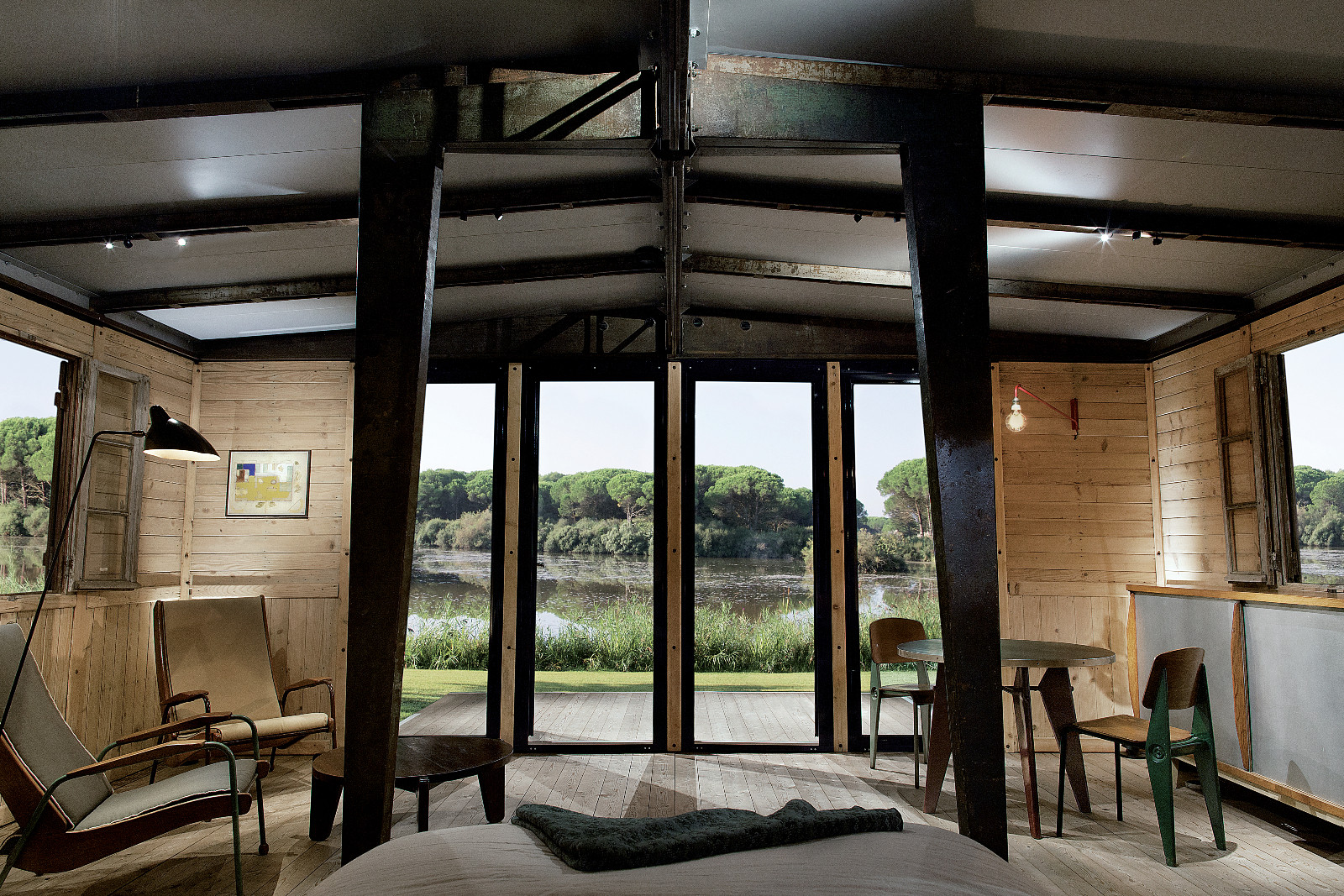 Prouvé’s 6x6 Demountable House by Rogers Stirk Harbour + Partners, a prime example of vintage furniture design that endures amid a modern context