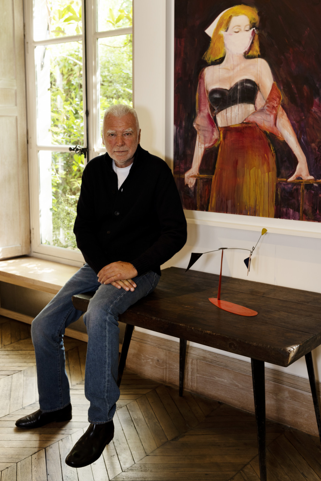 Vintage furniture gallery owner and enthusiast Patrick Seguin in his Paris apartment
