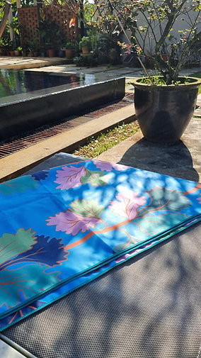 Santan Studio prints are applied across multiple products, including microfibre beach towels