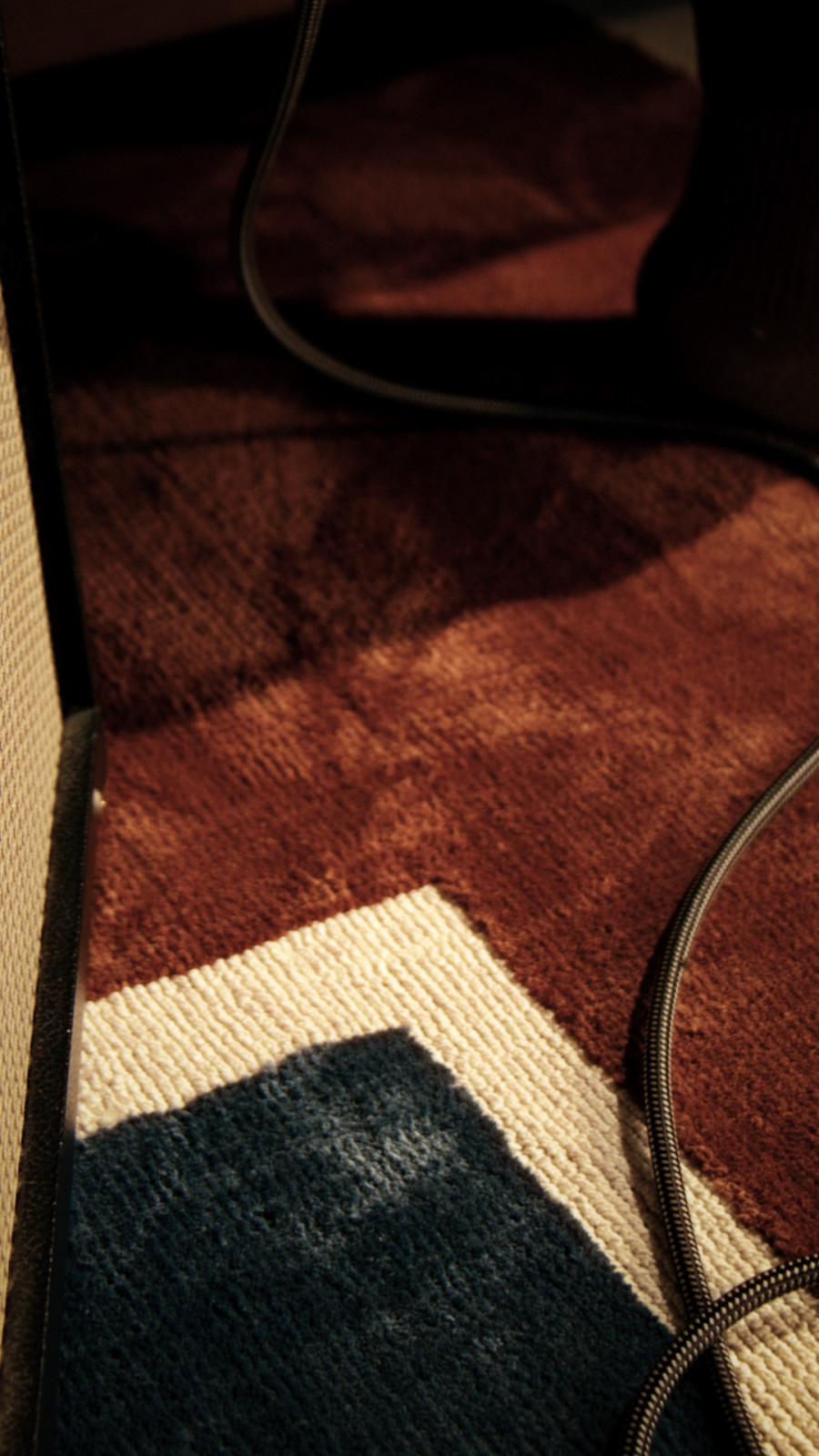 A detail from Rugsea’s Sunday Jazz Collection with Studio Three reveals sophisticated colour interplay that captures the bittersweet mood of a Sunday