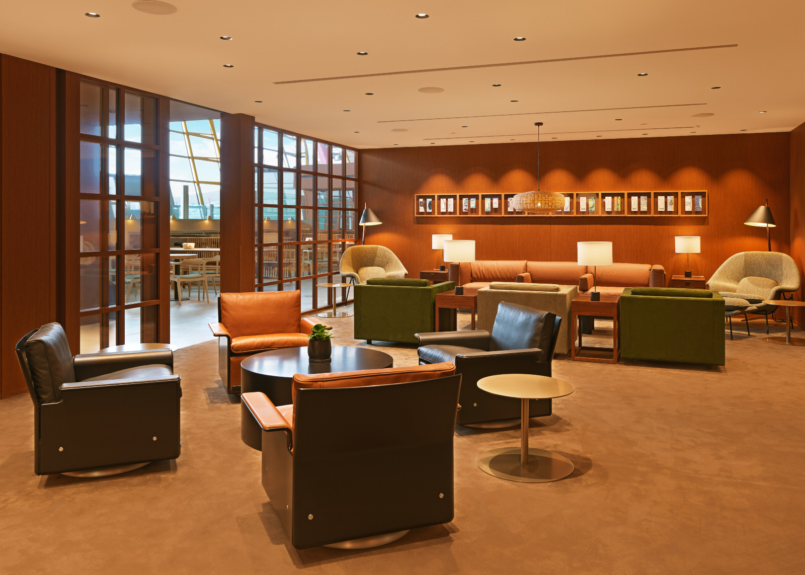 The main lounge offers a mix of intimate seating with designer furniture. (Photo: Cathay Pacific)