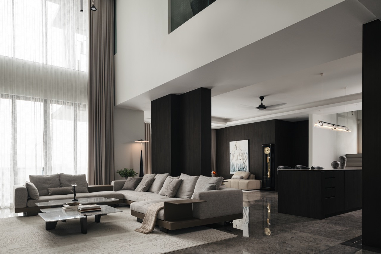 The double-volume living space visually connects both floors while maximising the generous land area in this multi-generational home
