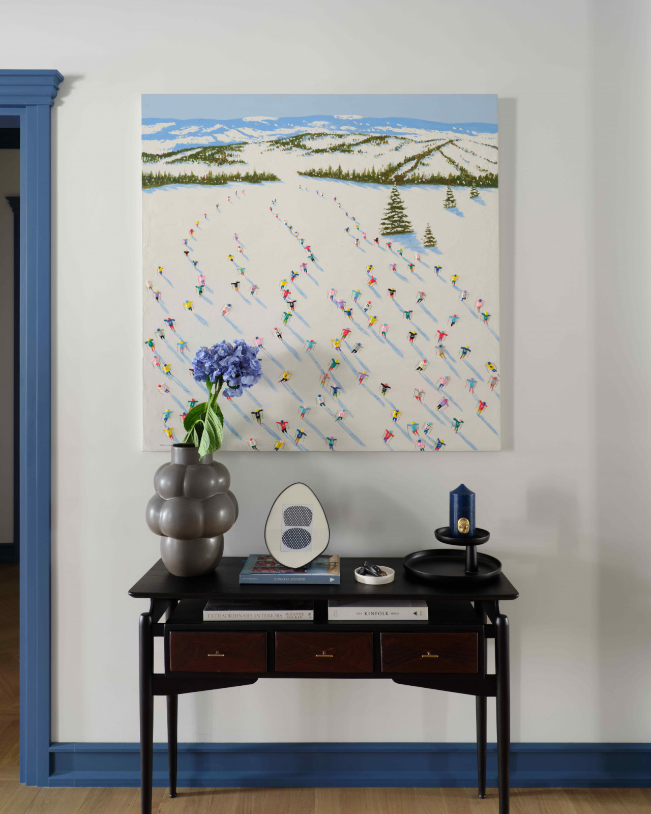 Santiago Navarro’s painting hangs above a custom console designed by Mamedov