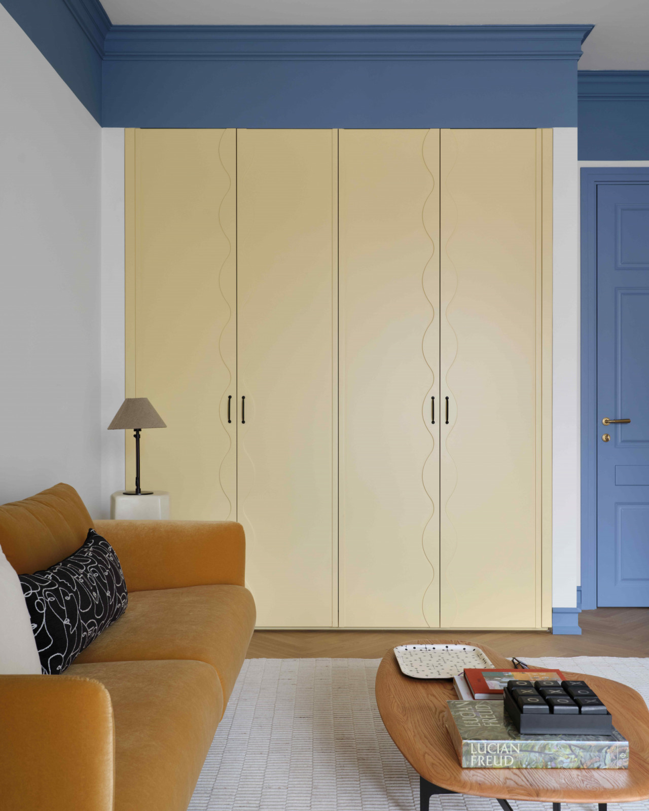 The guest room is a hybrid space for private reading, work, or art storage