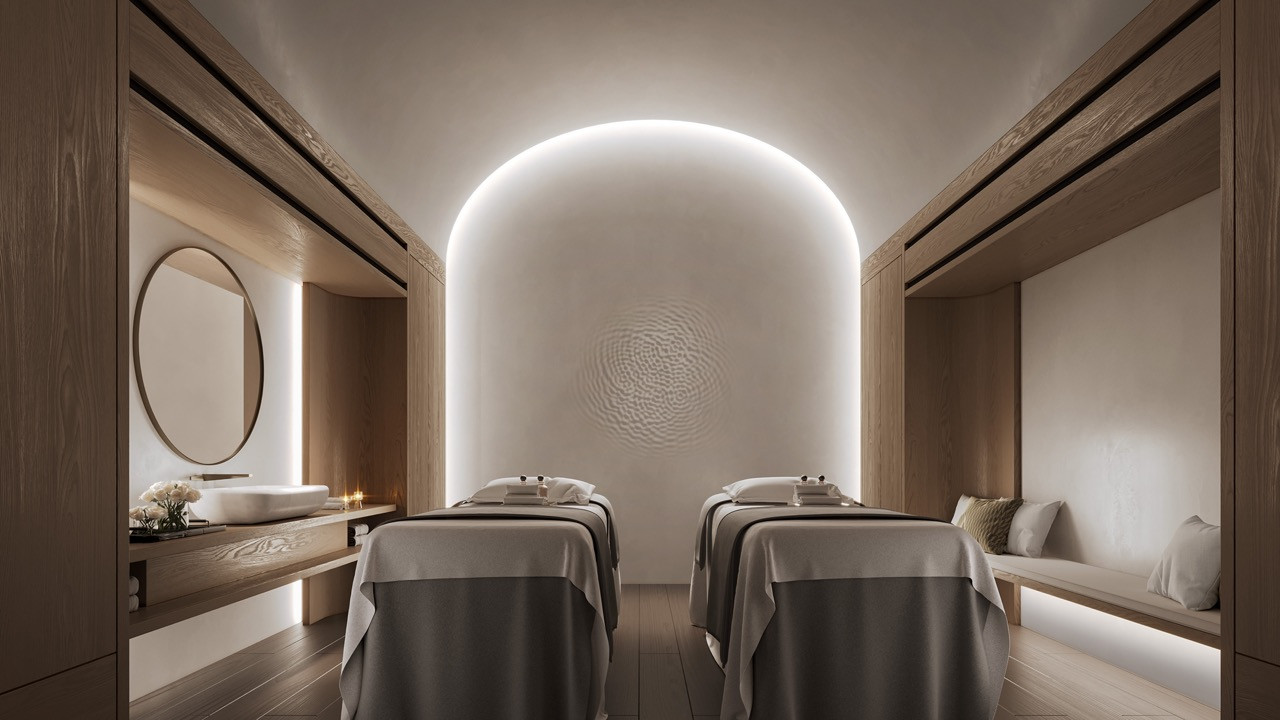 The spa treatment rooms continue Chan's design language of clean lines and natural materials, offering guests a serene retreat within the historic compound.