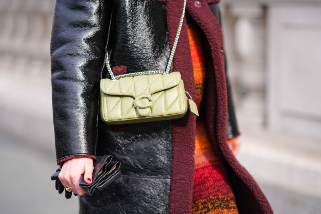 NEW YORK, NEW YORK - FEBRUARY 12: Close-up detail view of a green quilted leather bag from Coach, outside Coach, during New York Fashion Week, on February 12, 2024 in New York City. (Photo by Edward Berthelot/Getty Images)