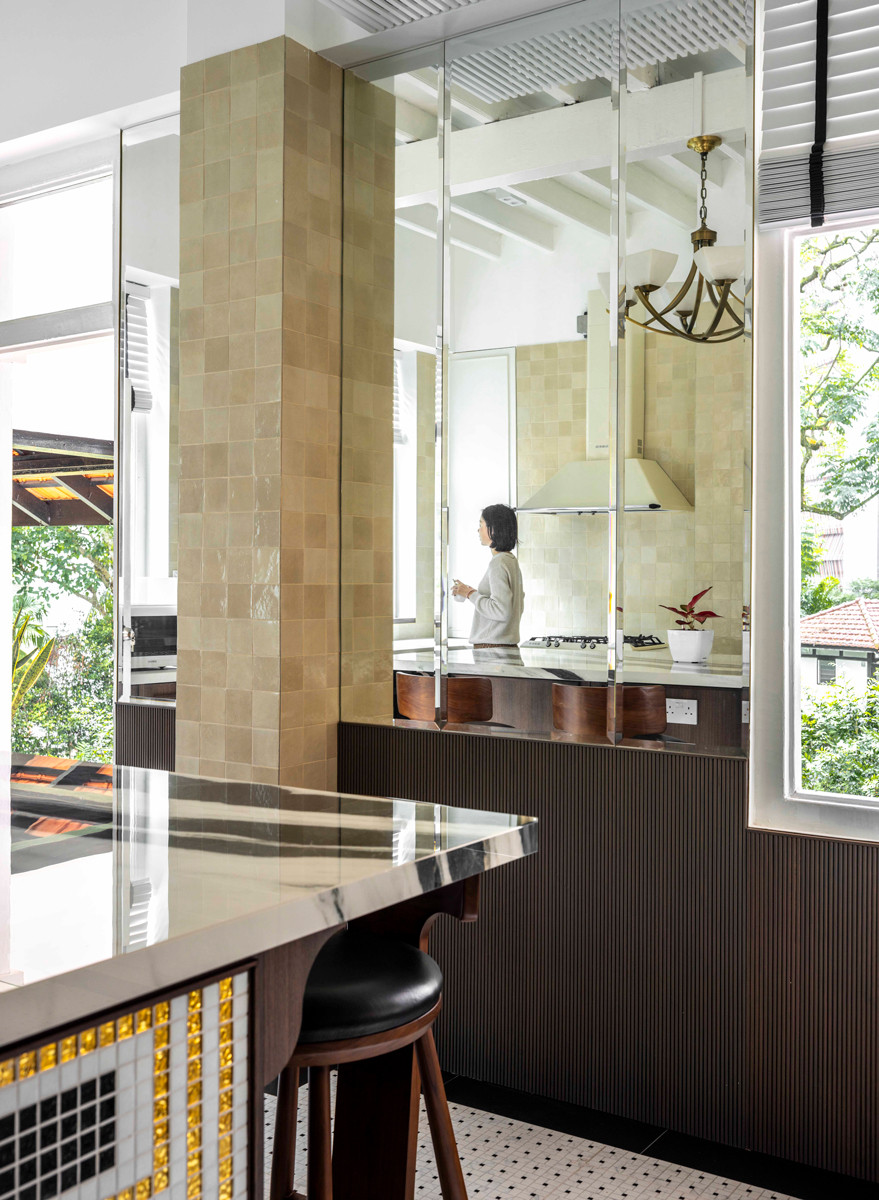 A layered view of the kitchen reveals the many nuanced details that weave old-world charm with contemporary function