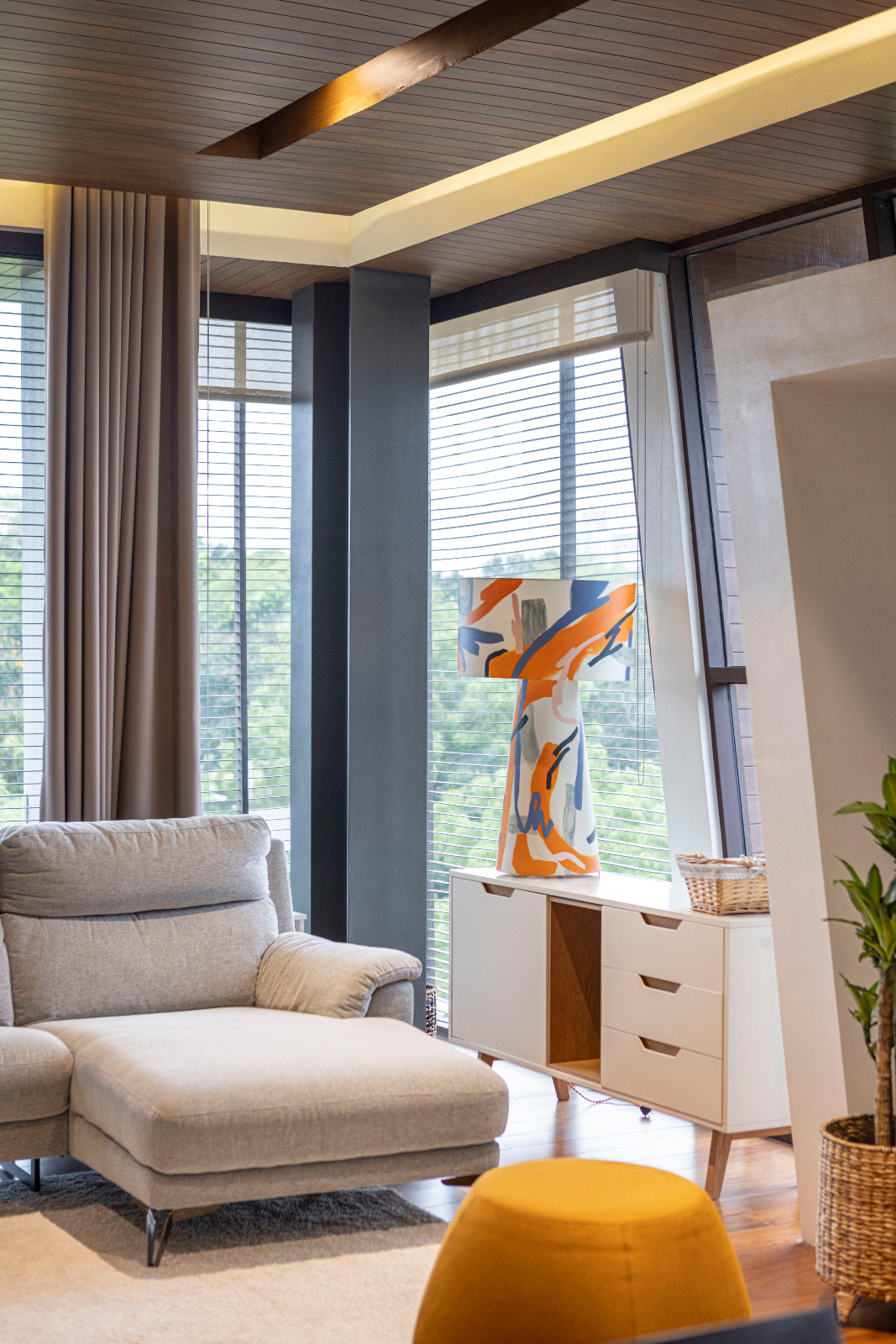 The family room and study of a vertical Filipino home in Manila, Philippines, designed by Barchan + Architecture