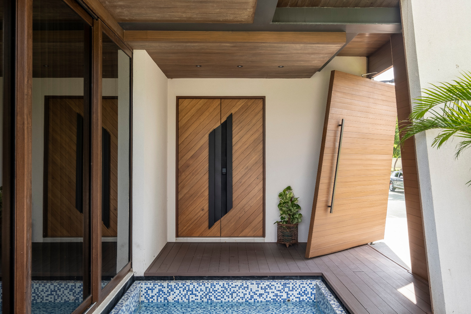 The entryway of a vertical Filipino home in Manila, Philippines, designed by Barchan + Architecture