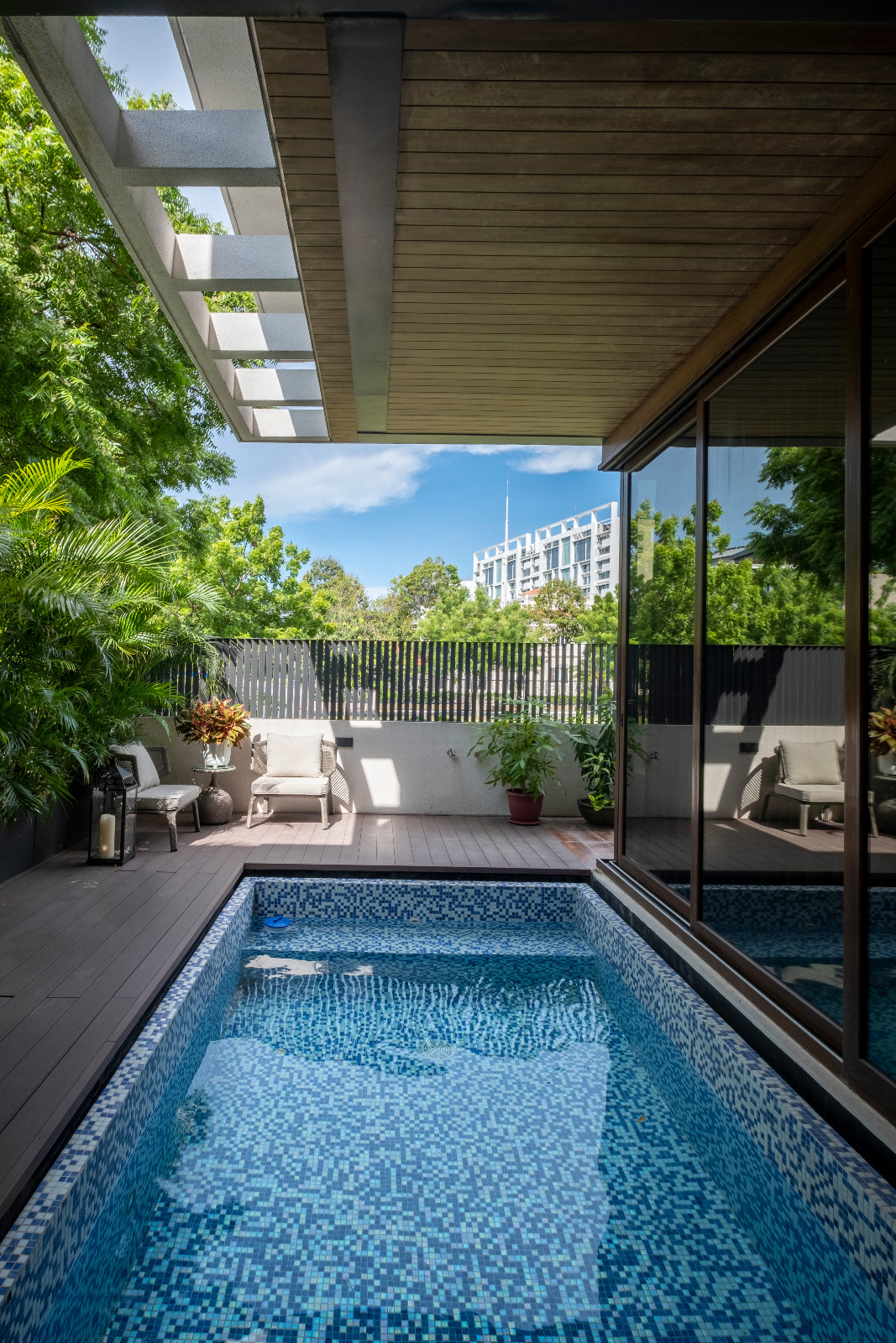 The entryway of a vertical Filipino home in Manila, Philippines, designed by Barchan + Architecture
