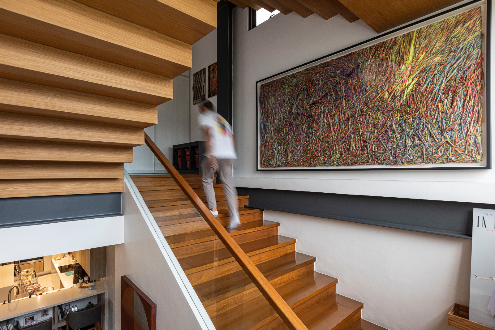 The stairway of a vertical Filipino home in Manila, Philippines, designed by Barchan + Architecture