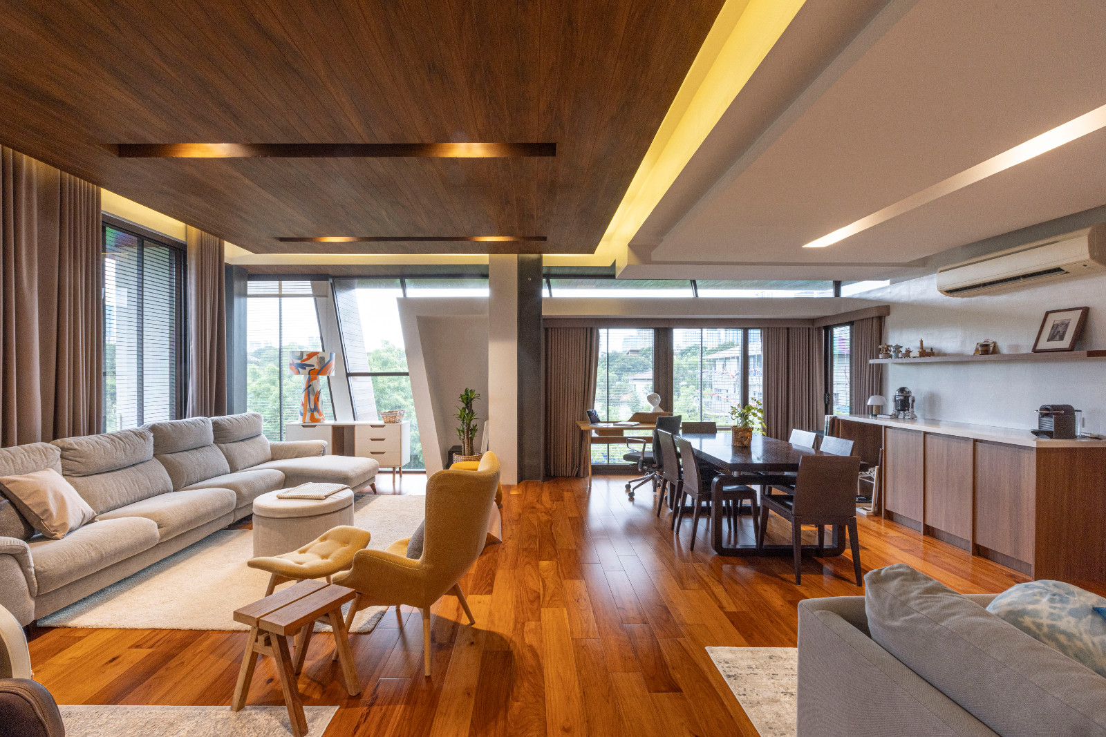 The family room and study of a vertical Filipino home in Manila, Philippines, designed by Barchan + Architecture