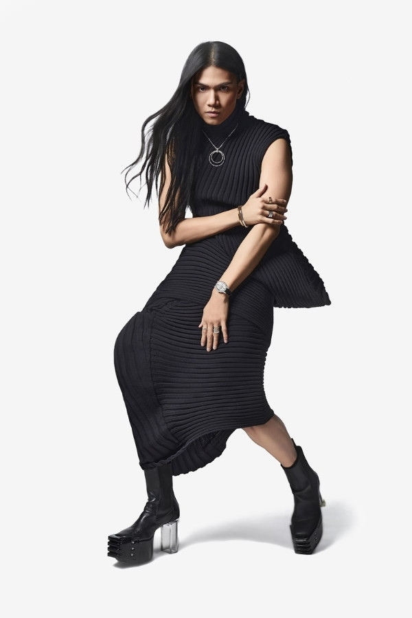 Nazreem wears Chopard Ice Cube rings and bracelets, L’heure du Diamant watch, artisanal piece necklace; Issey Miyake top and skirt; Nazreem’s own shoes