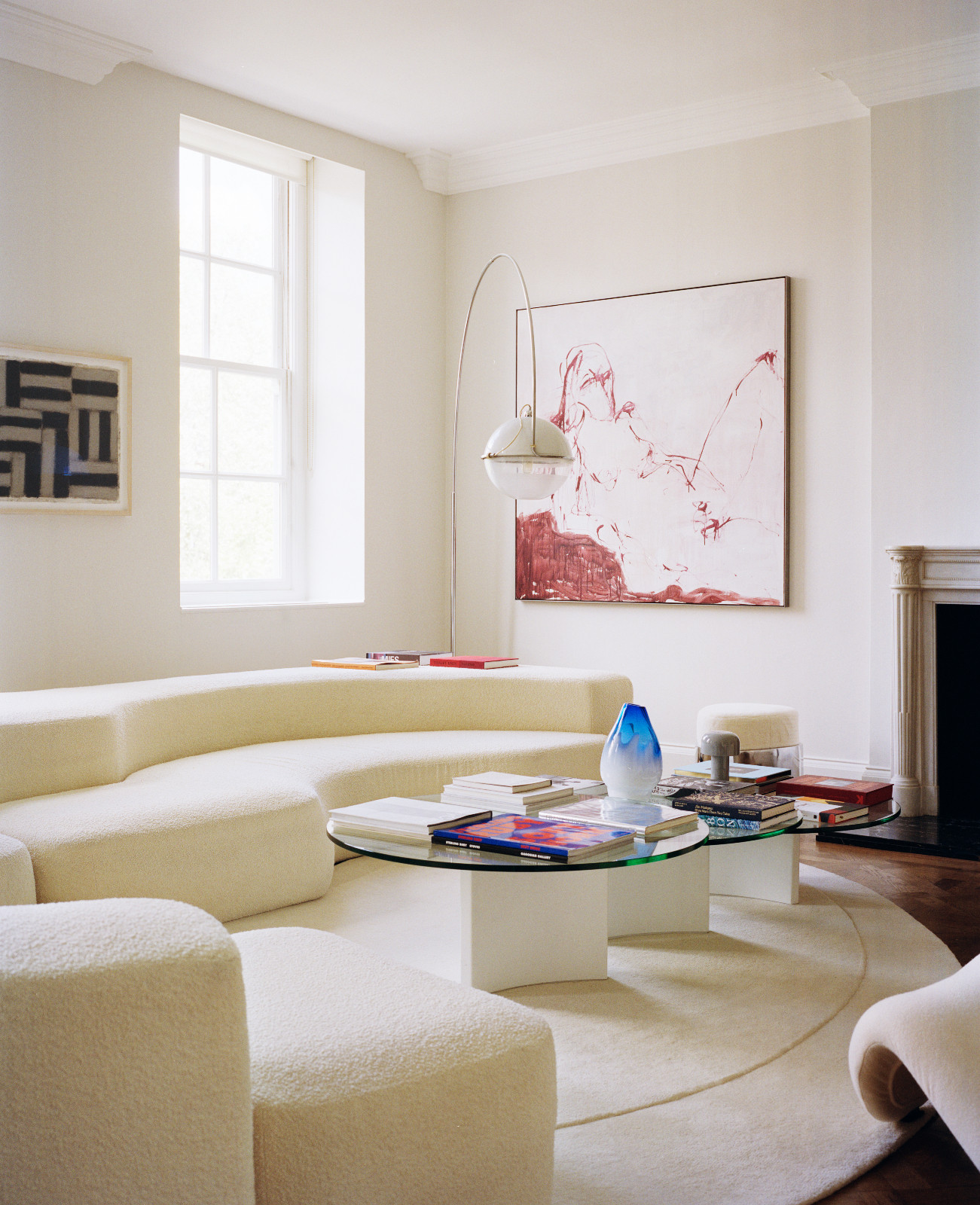 Lawrence Van Hagen's living room in his London home, where works by Tracey Emin, Sean Scully and Larry Bell are set among sculptural seating and mid-century lighting