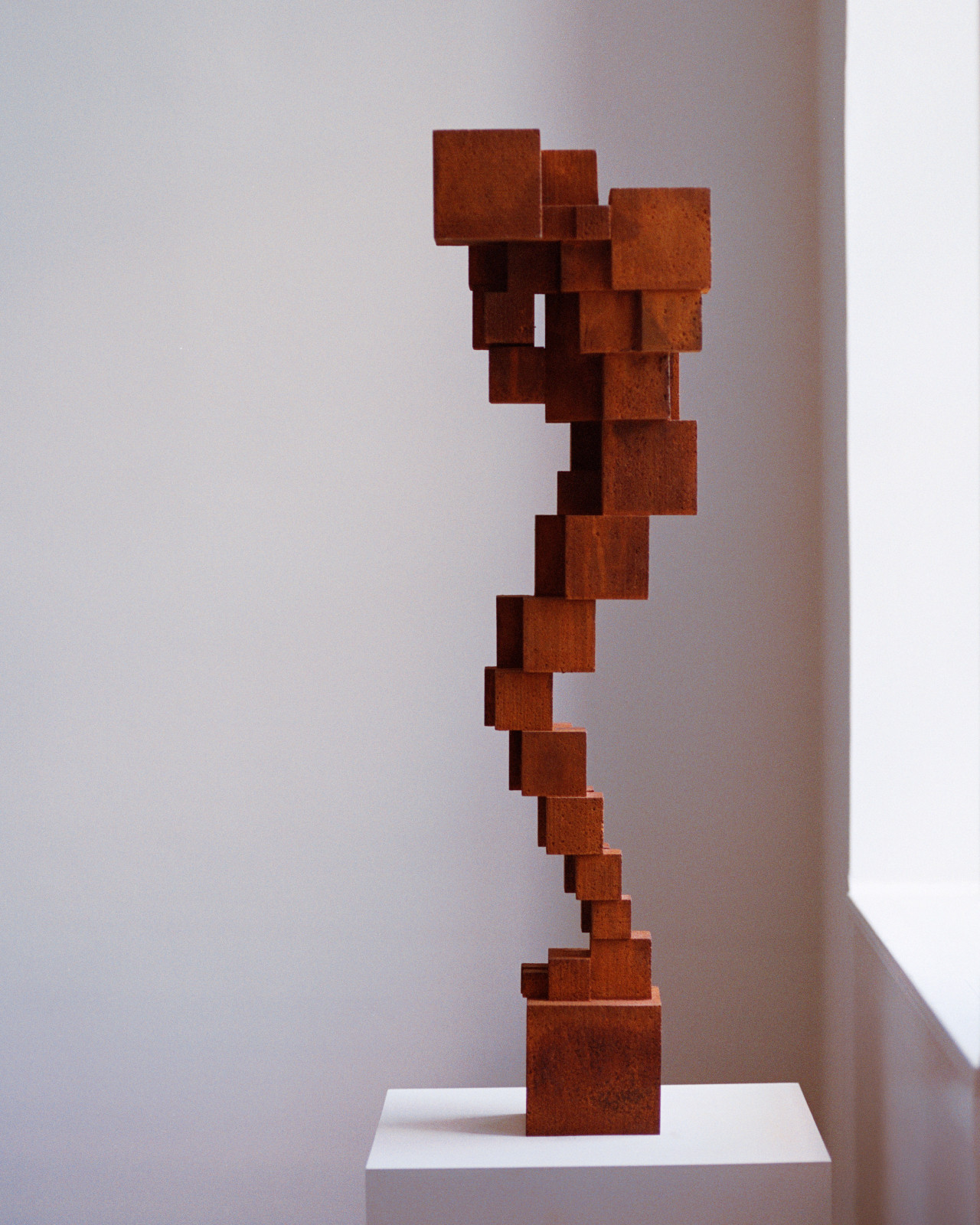 An Antony Gormley cast iron sculpture in Lawrence Van Hagen's London home