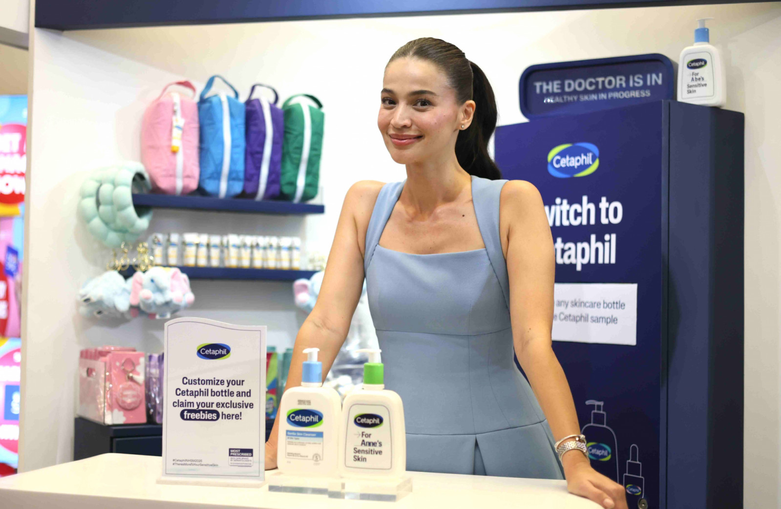Cetaphil brand ambassador Anne Curtis-Smith at the activity area at the National Healthy Skin Mission booth, where people can customise their Cetaphil bottles with stickers and charms, and even swap their empty cleansers