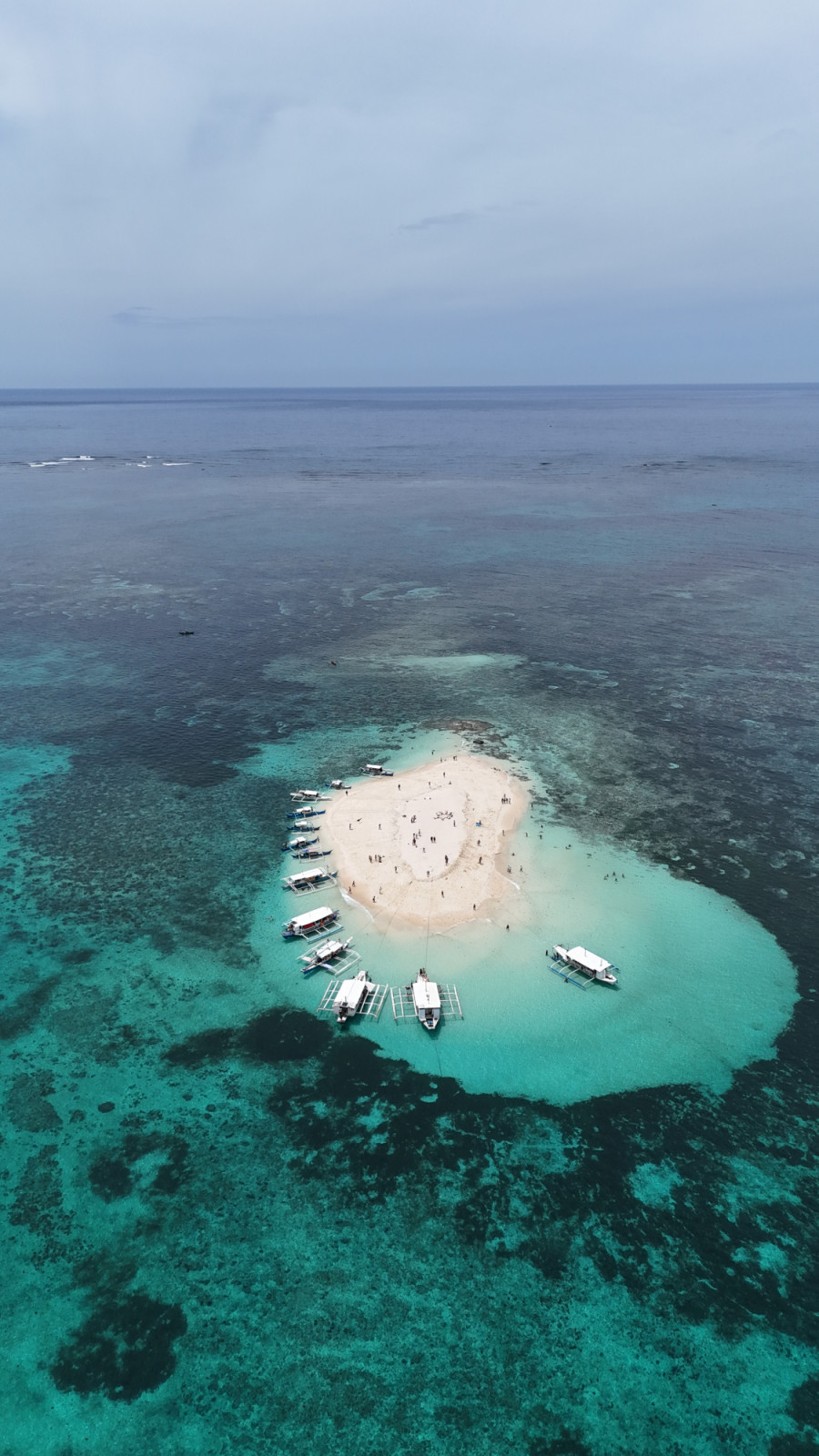 The main sandbar in Siargao is called Naked Island, a pristine, treeless strip of white sand surrounded by turquoise waters (Photo: AK flydron/Instagram)