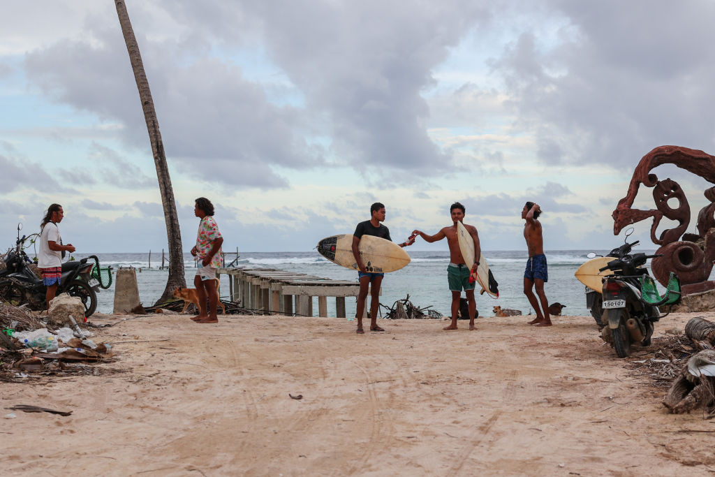 Surfers enjoy at the Cloud 9 in Siargao (Photo: Getty)