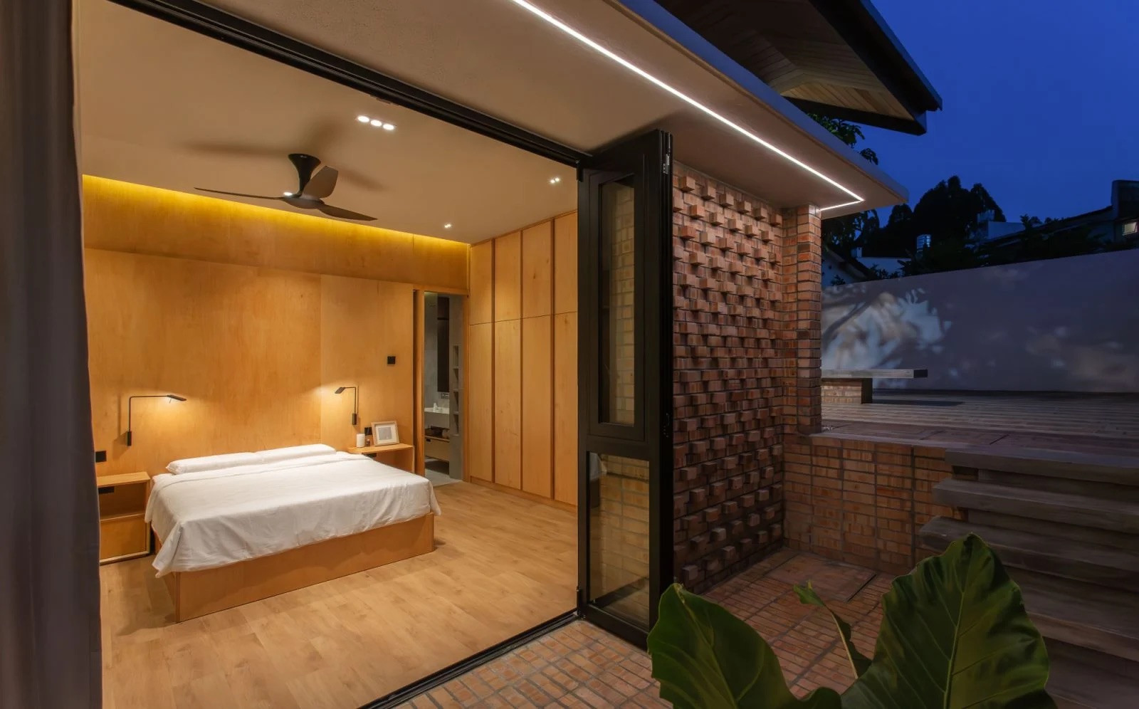 The bedroom opens out to a private garden (Photo: Ameen Deen)
