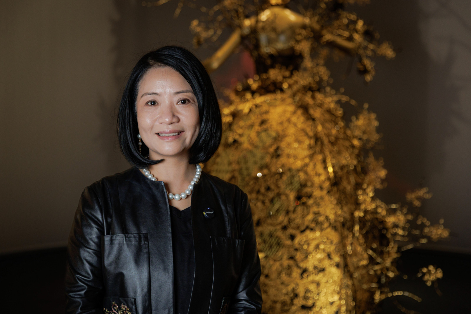 HONG KONG, CHINA - 2024/09/21: A portrait of Guo Pei at her exhibition at M+ Gallery in Hong Kong. The exhibition will last until April 2025.
Guo Pei is the renowned Chinese haute couture designer celebrated for her intricate, opulent designs that seamlessly blend traditional Chinese craftsmanship with modern fashion. Known for her breathtakingly detailed creations, including the iconic yellow gown worn by Rihanna at the 2015 Met Gala, Guo Pei became the first Asian member of the Chambre Syndicale de la Hau