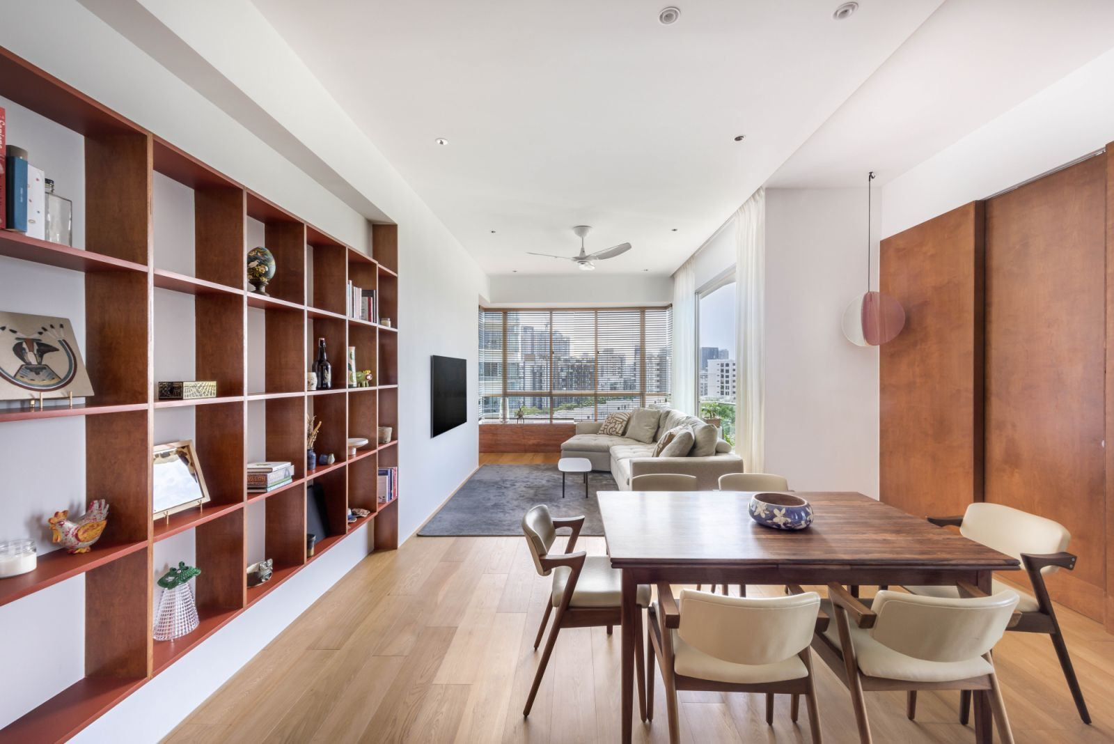 The mid-century modern apartment’s dining area, connected to the living room